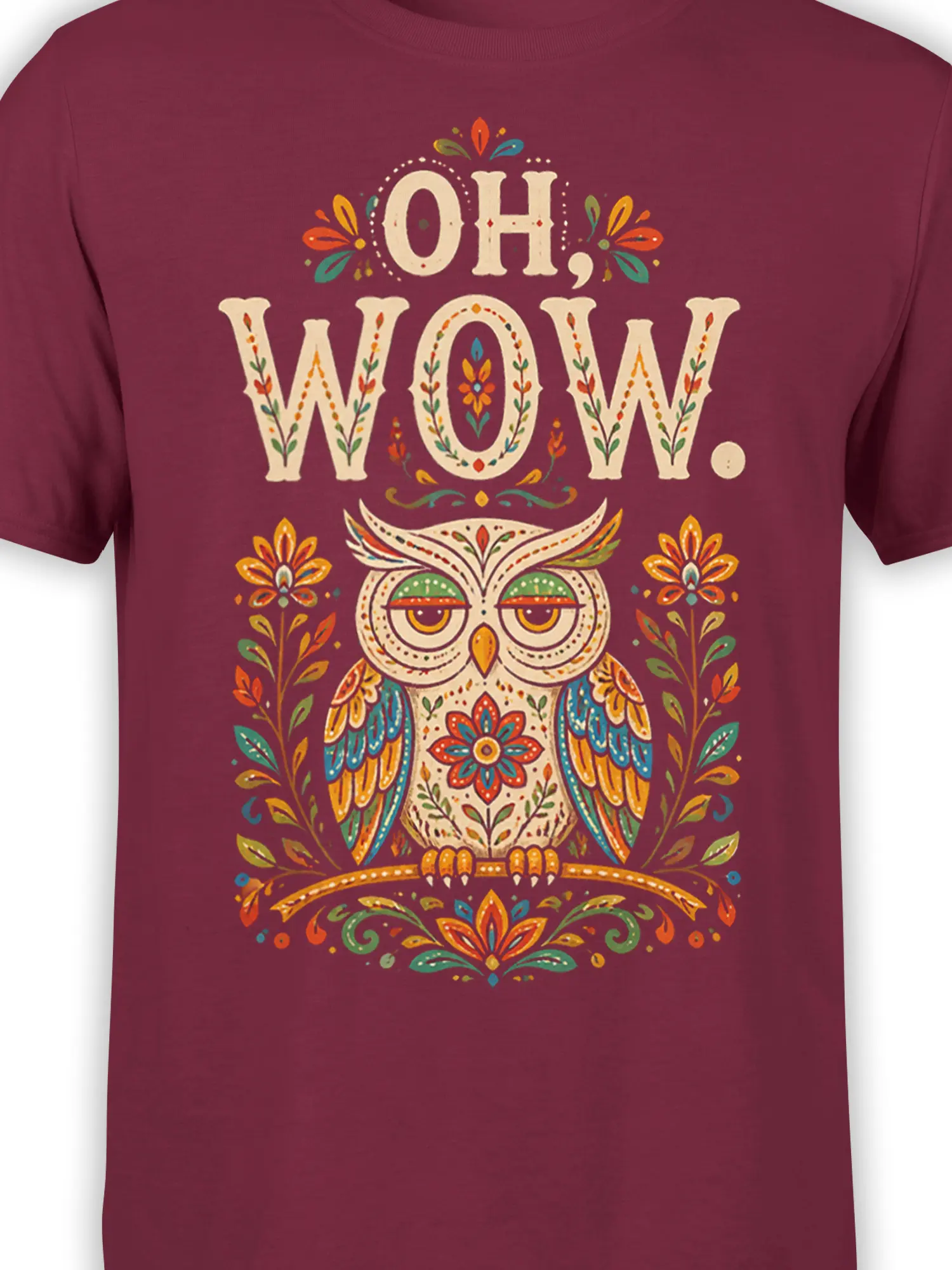 Close-up of the colorful folk-art owl design and “OH WOW.” lettering on a burgundy shirt