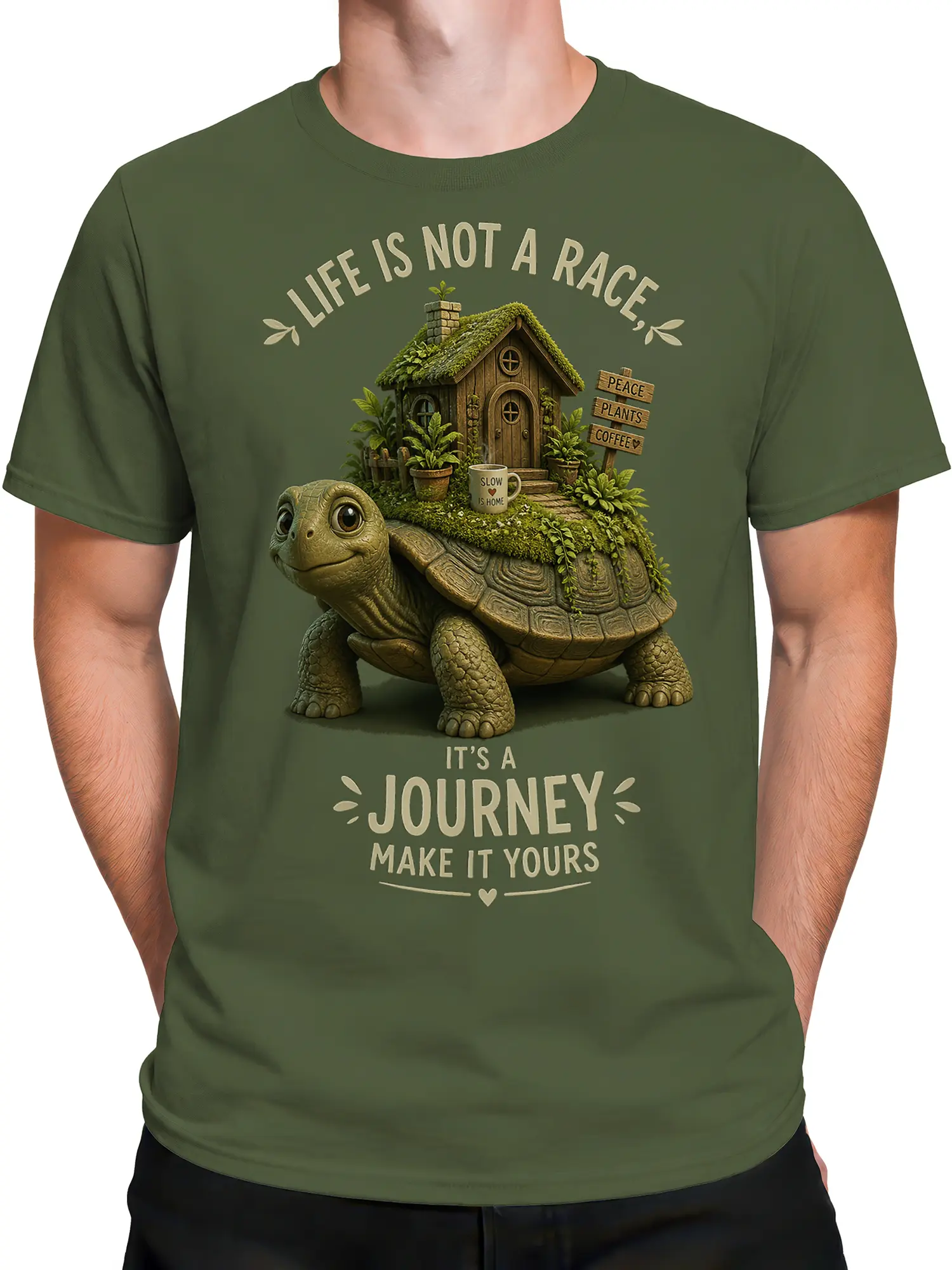 Male torso wearing a green turtle T-shirt with a cottage garden, coffee mug, and slow-living quote