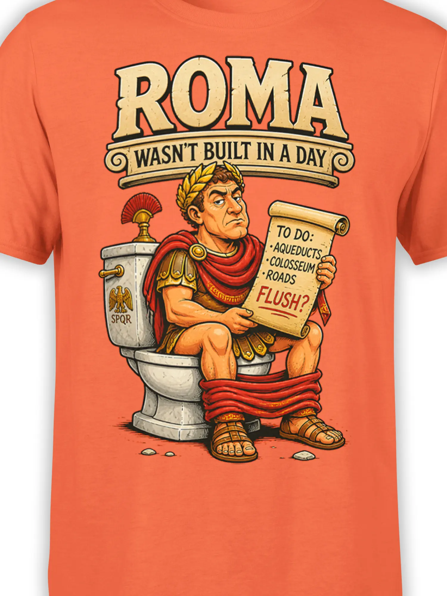 Close-up of the Roman soldier, laurel wreath, toilet, scroll, and “ROMA” lettering on an orange shirt