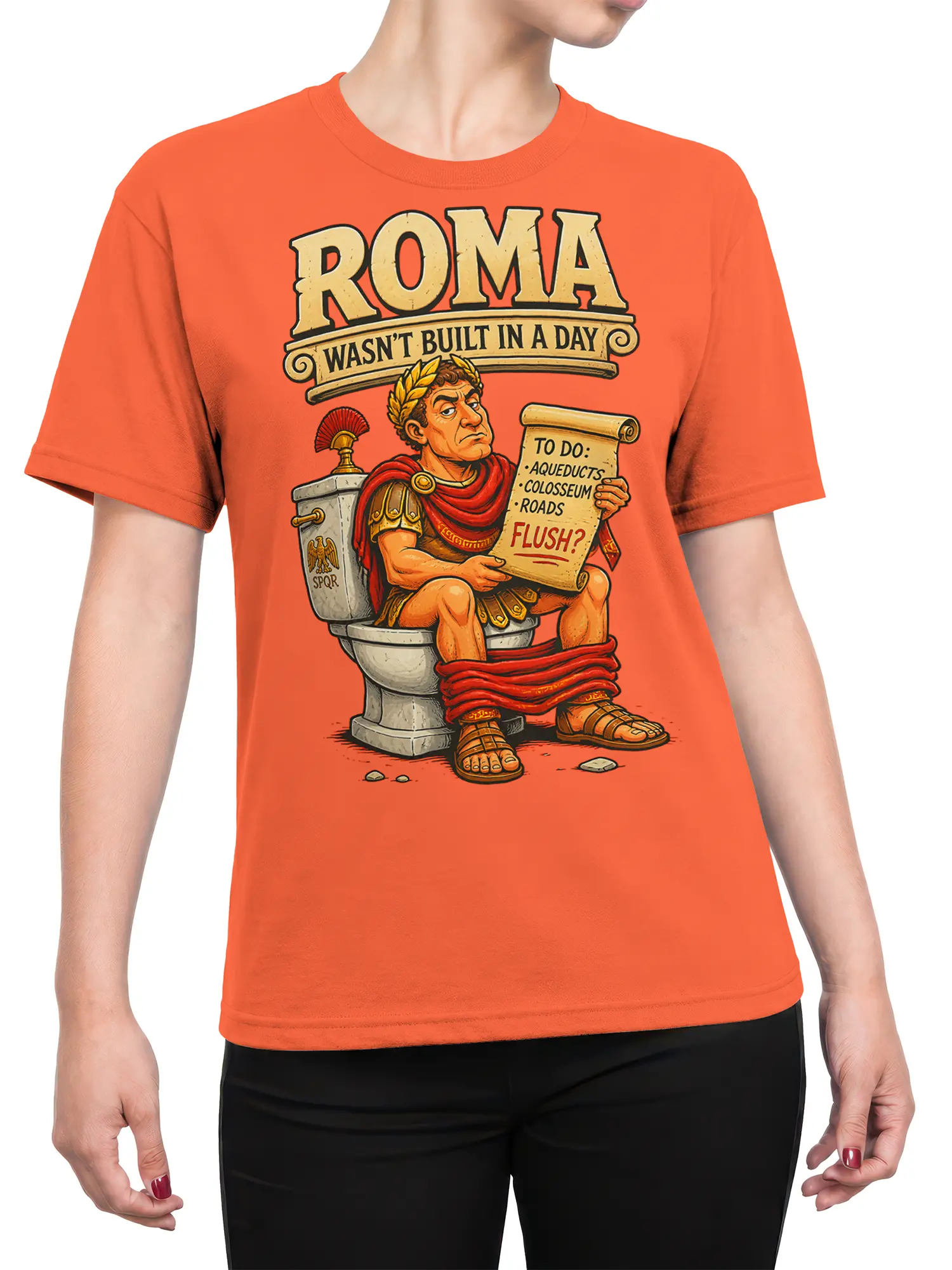 Female torso wearing an orange T-shirt with a Roman soldier, toilet humor scroll, and vintage “ROMA” design
