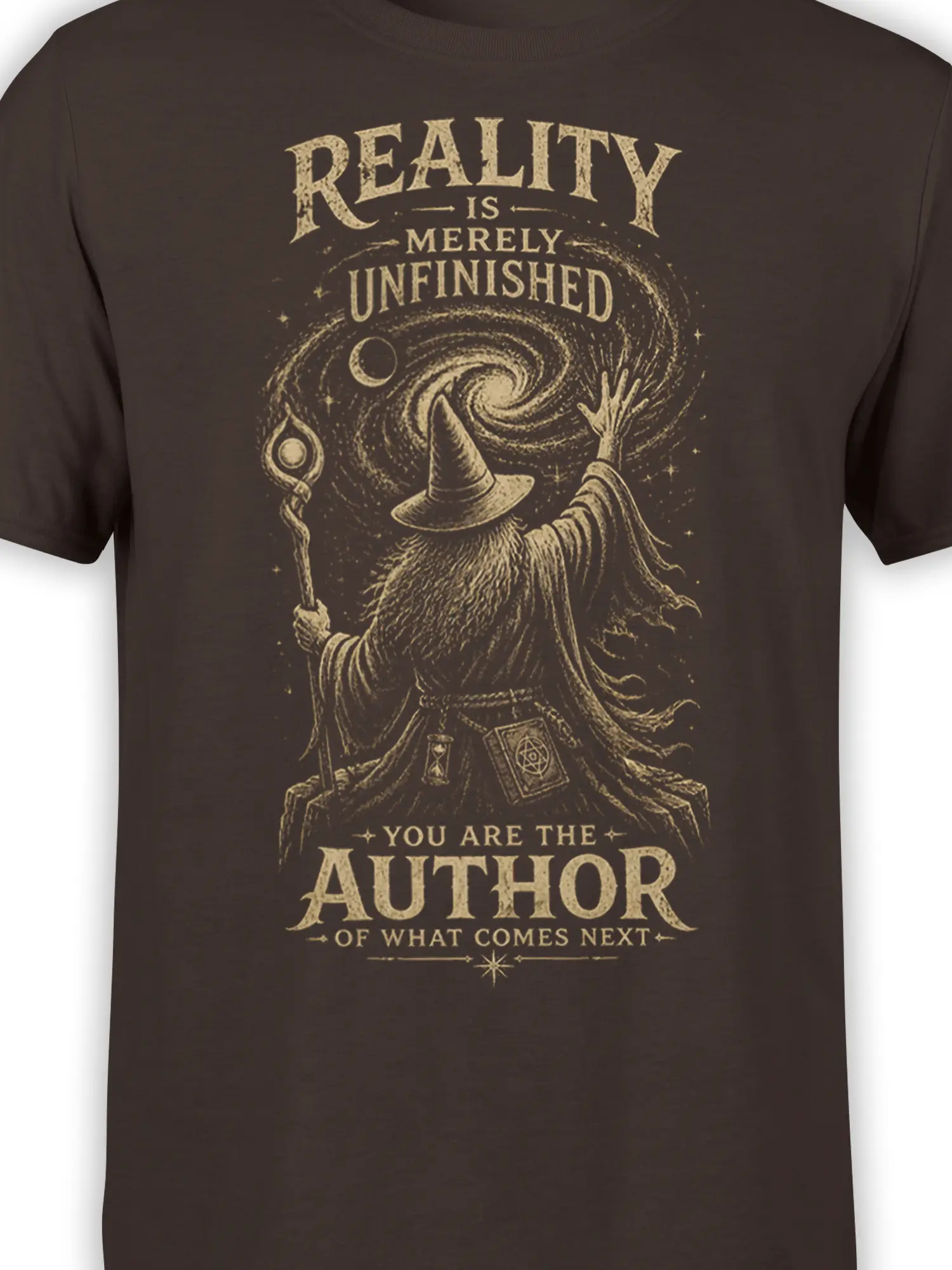 Close-up of the brown fantasy shirt showing a wizard, celestial galaxy, stars, and inspirational author message