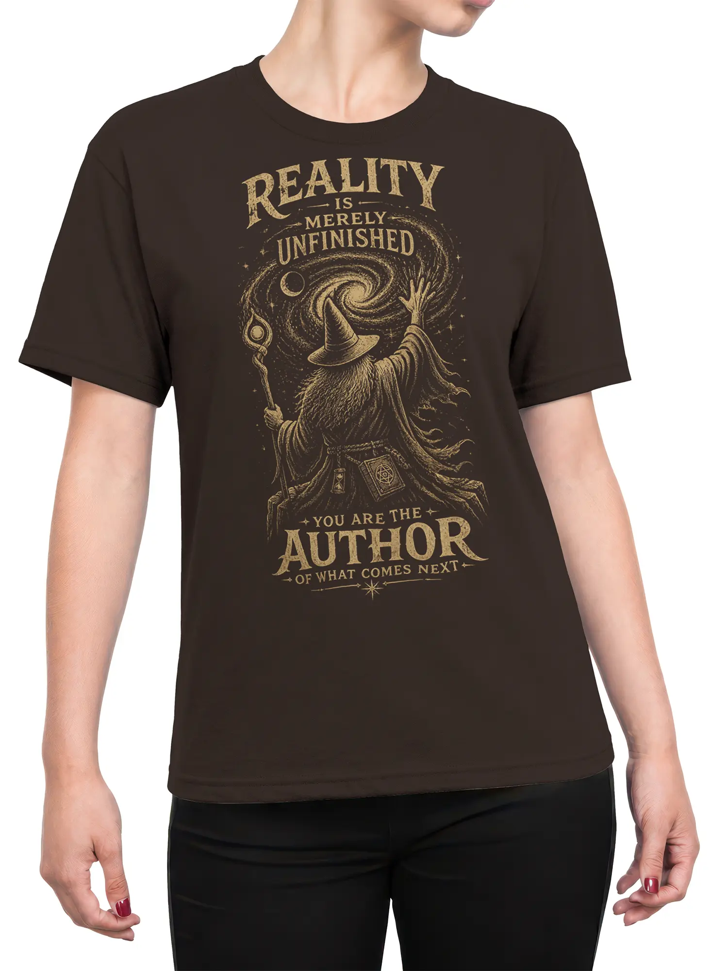 Female torso wearing a brown wizard T-shirt with a cosmic galaxy design and creative future-focused message