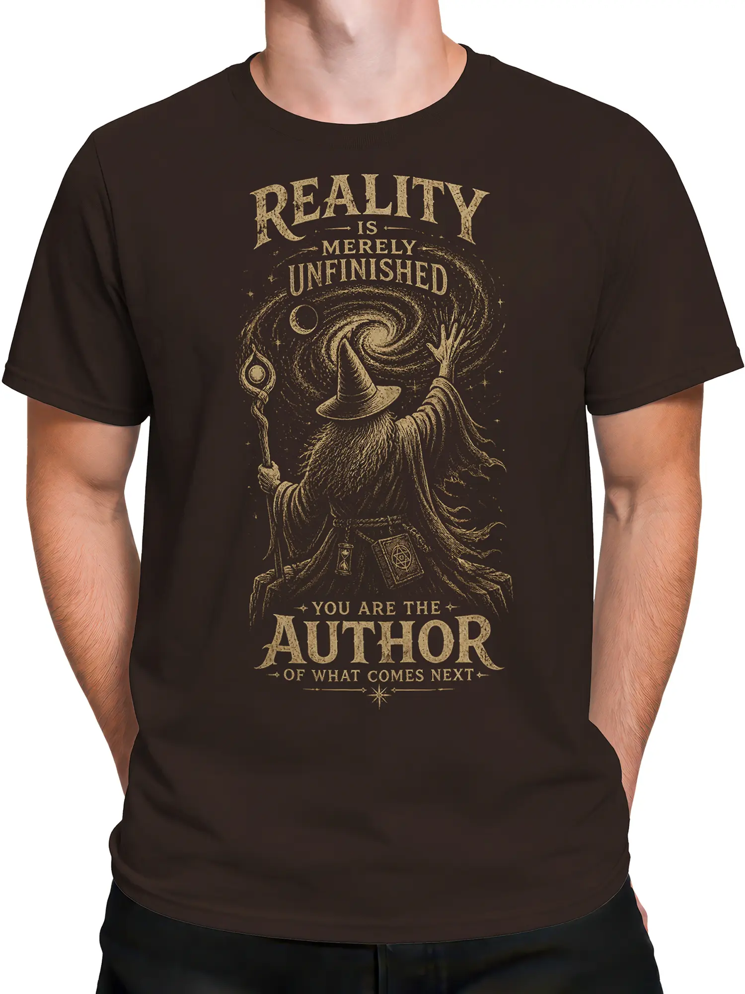 Male torso wearing a brown fantasy T-shirt with a bearded wizard, galaxy swirl, and author-themed text