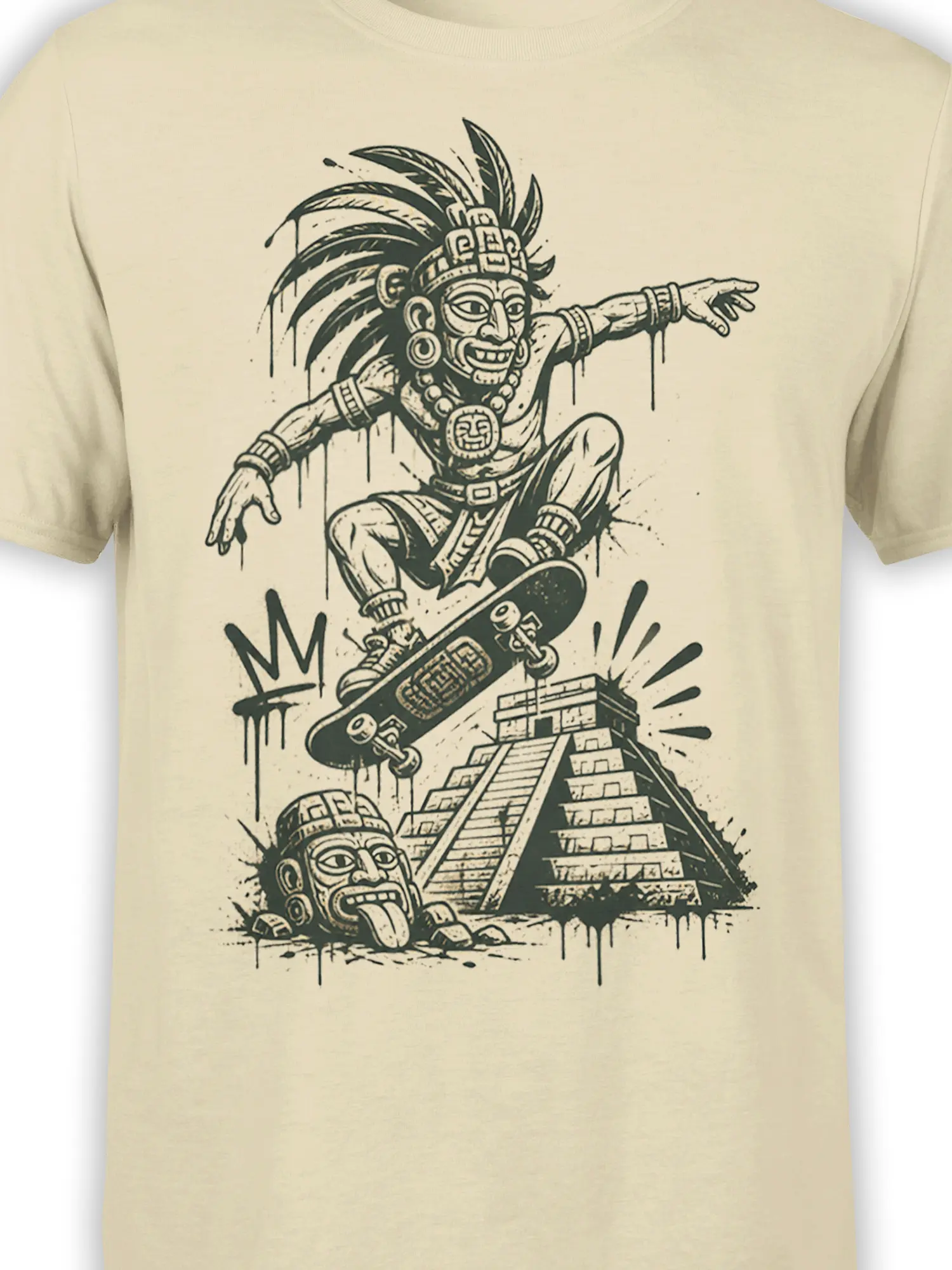 Close-up of the beige skateboard tee showing the feathered figure, skateboard, pyramid, and dark ink details