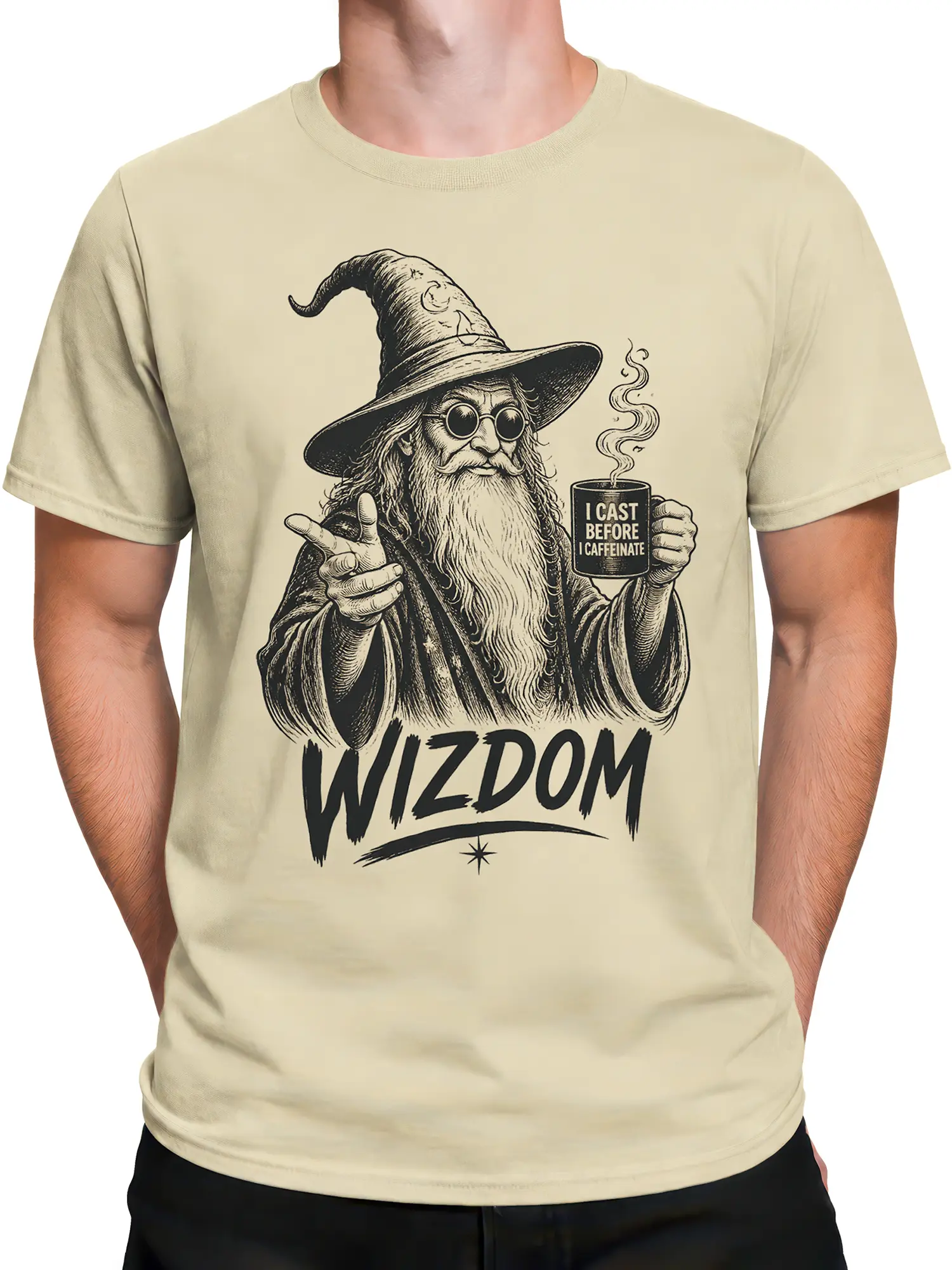Male torso wearing a beige vintage wizard coffee T-shirt with bold “WIZDOM” lettering