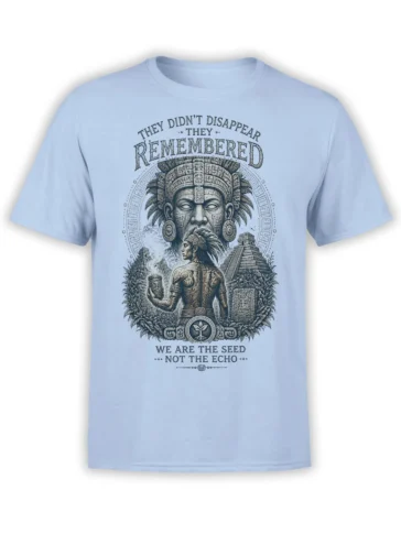 Indigenous warrior and ancient temple artwork with memory-themed text on a light blue T-shirt