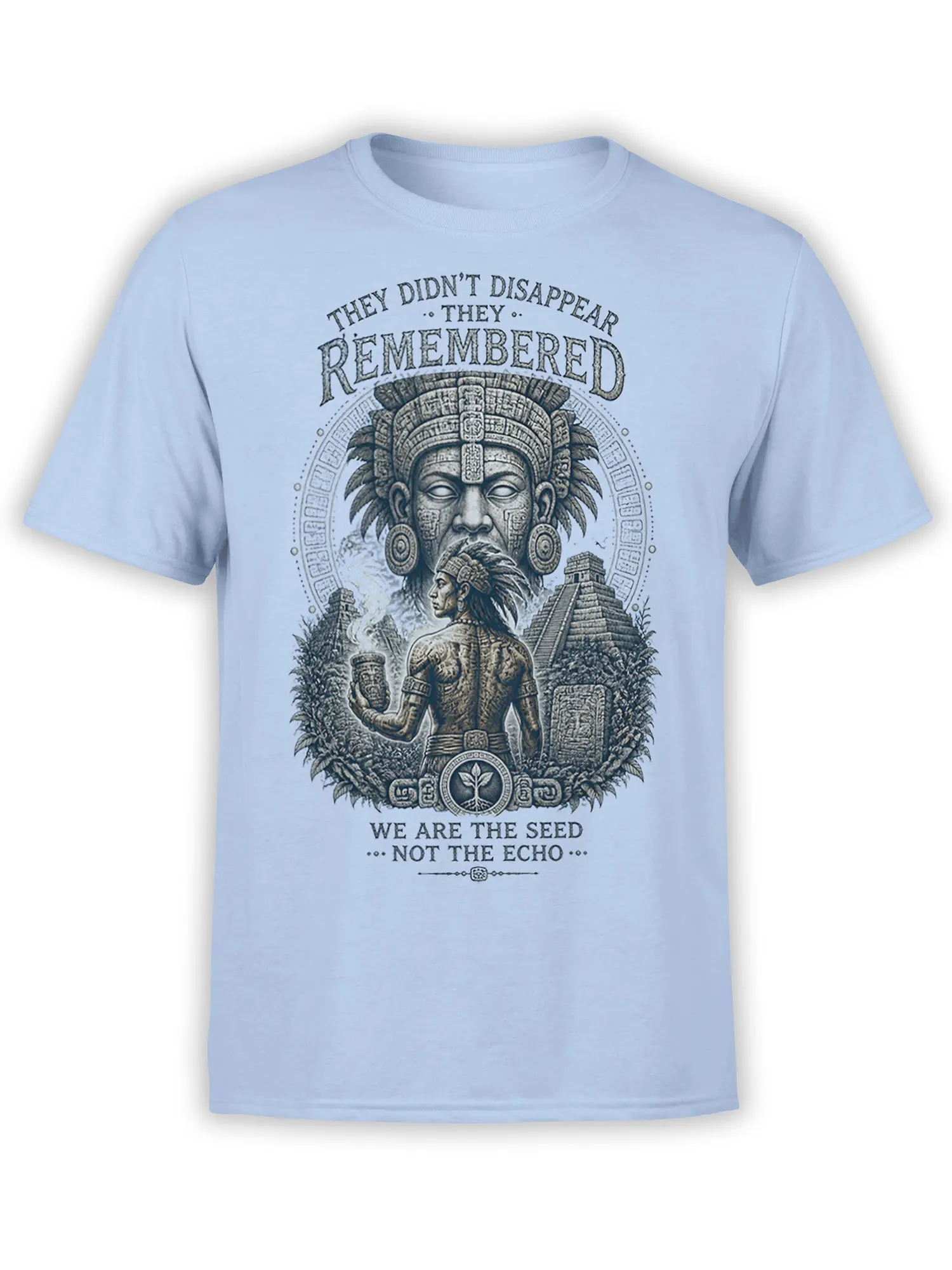 Indigenous warrior and ancient temple artwork with memory-themed text on a light blue T-shirt