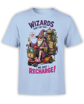 Light blue wizard T-shirt with a bearded cat wizard, magical books, pink slippers, and “We Just Recharge” text