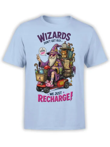 Light blue wizard T-shirt with a bearded cat wizard, magical books, pink slippers, and “We Just Recharge” text