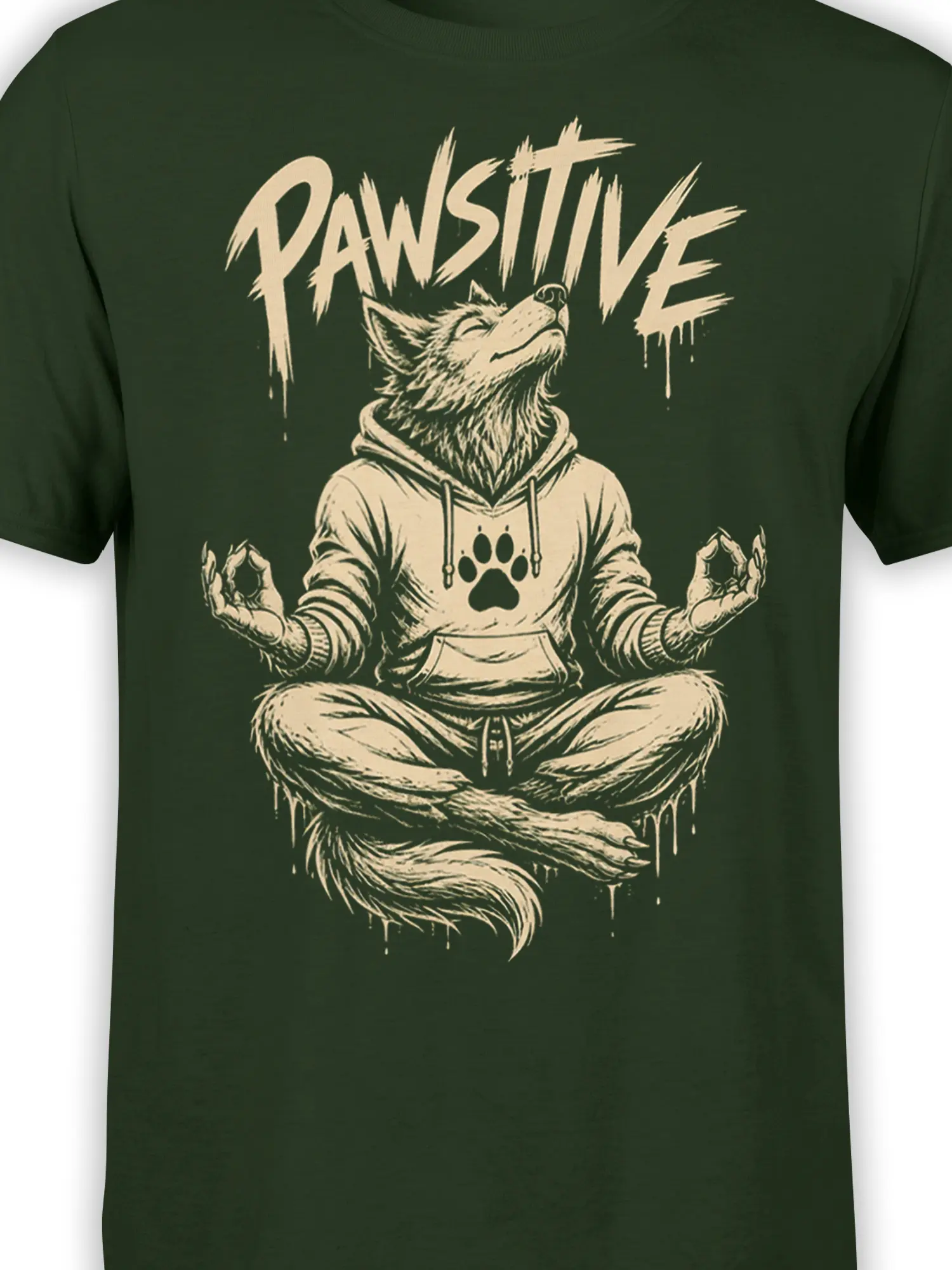 Close-up of meditating wolf artwork and PAWSITIVE lettering on a green graphic T-shirt