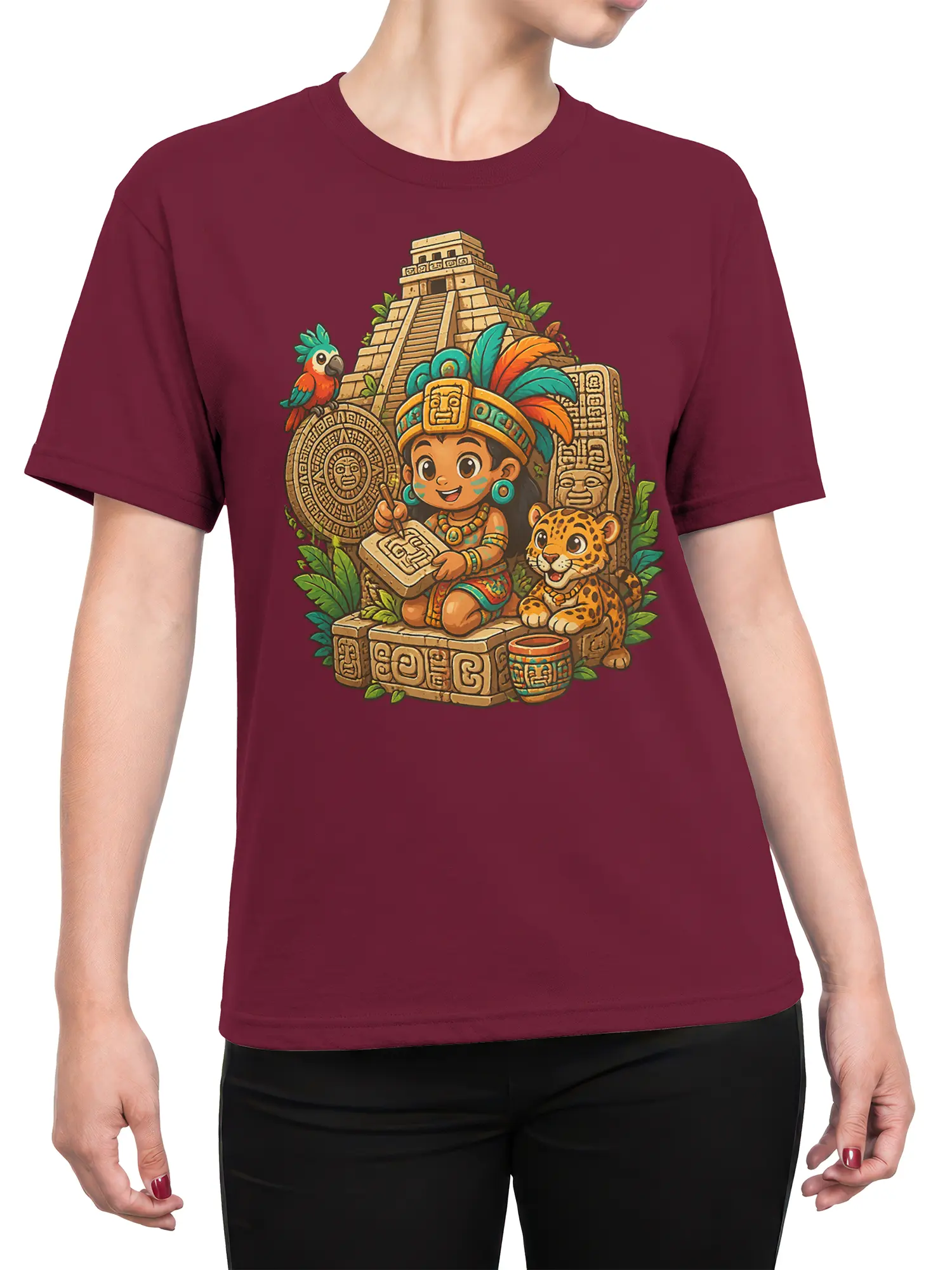 Female torso wearing a burgundy T-shirt with a colorful jungle temple scribe and jaguar design