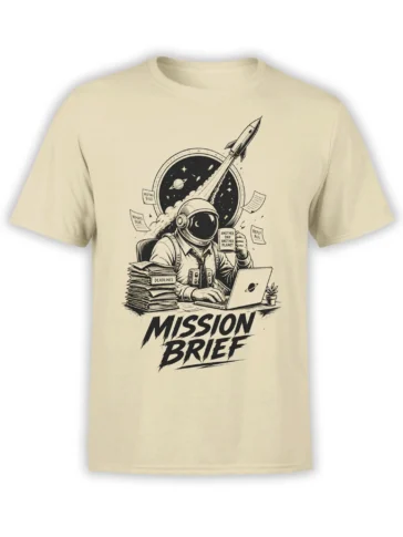 Beige astronaut T-shirt with a rocket, planets, office deadlines, and bold “MISSION BRIEF” lettering