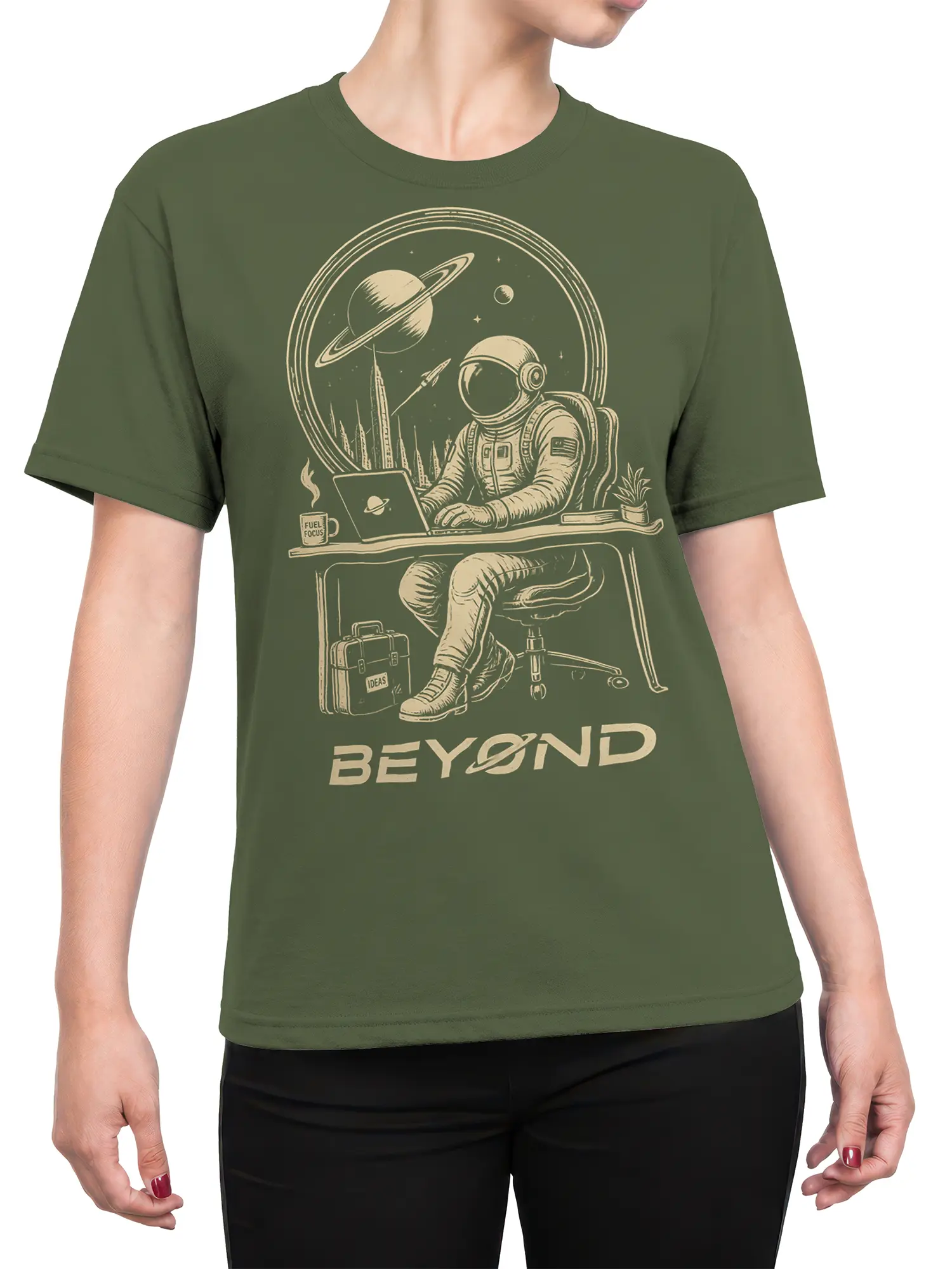 Female torso wearing an olive green astronaut T-shirt with vintage space office artwork and BEYOND lettering