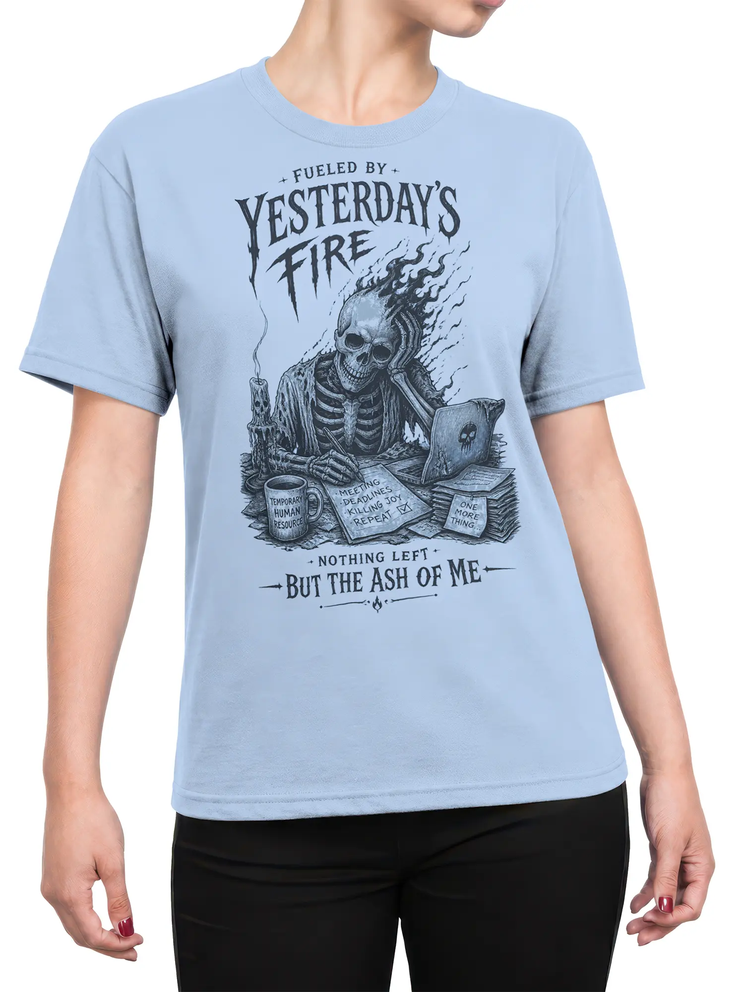 Female torso wearing a light blue skeleton office burnout T-shirt with skull laptop and deadline artwork