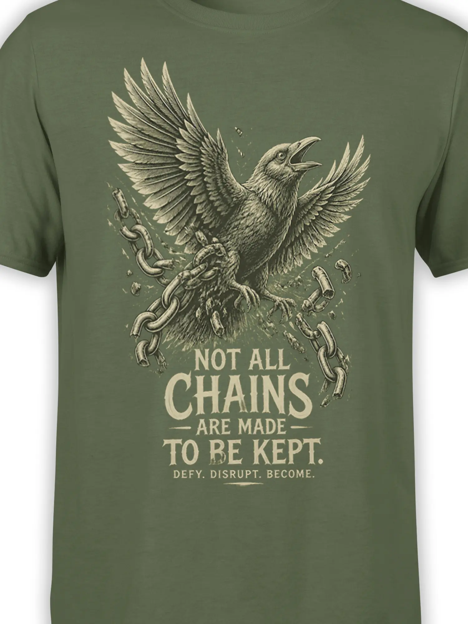 Close-up of raven wings and broken chains on a green freedom message T-shirt