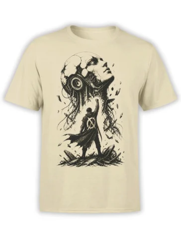 Beige fantasy T-shirt with a caped figure facing a giant cracked face in detailed black ink artwork