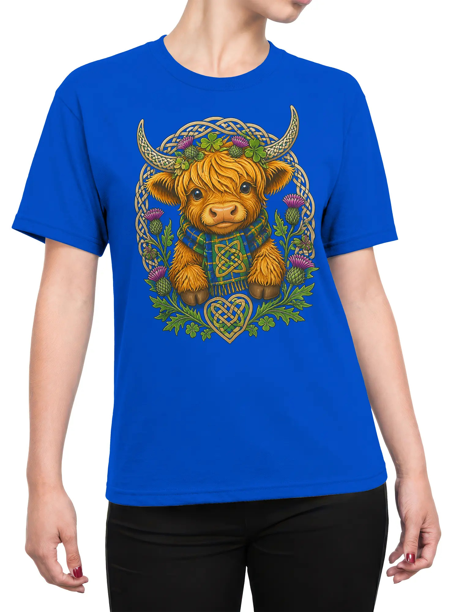 Female torso wearing a blue T-shirt with a Celtic Highland cow, thistles, shamrocks, and knotwork design