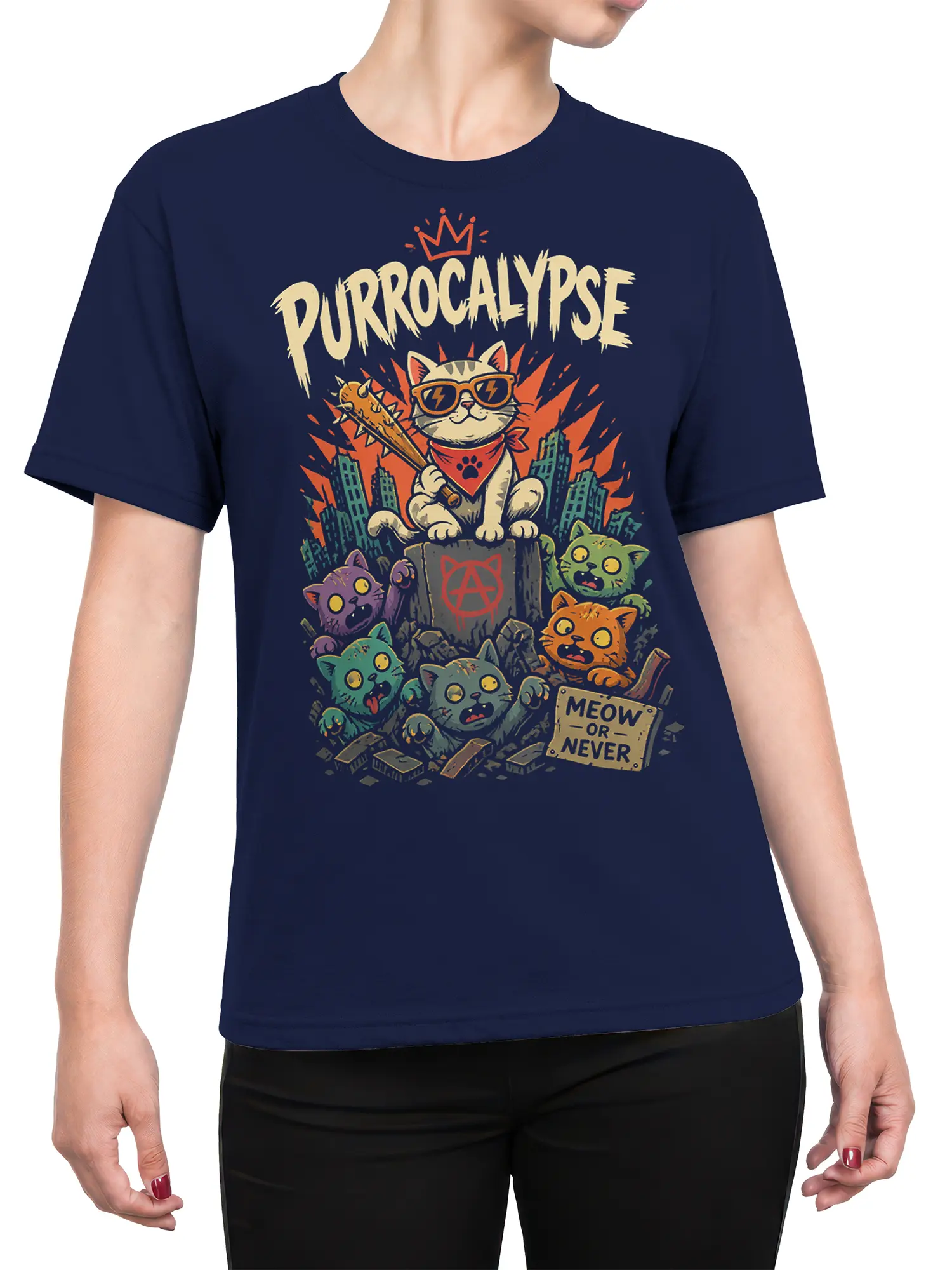Female torso wearing navy cat apocalypse T-shirt with crowned cat, colorful kittens, rubble, and bold Purrocalypse design