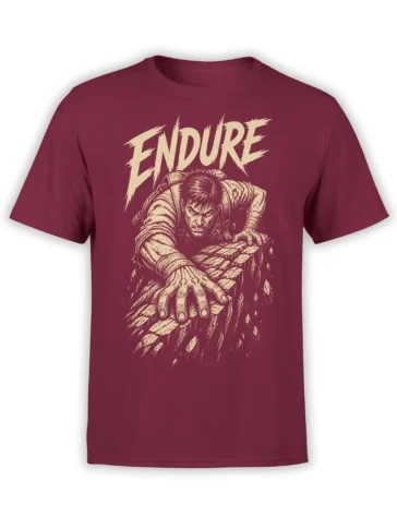 Burgundy T-shirt with a rugged climber reaching across cracked rock beneath bold cream ENDURE lettering