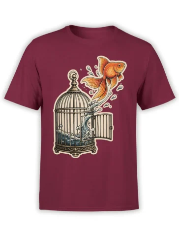 Orange-gold fish escaping an ornate birdcage on a burgundy fish T-shirt with flowing water and bubbles