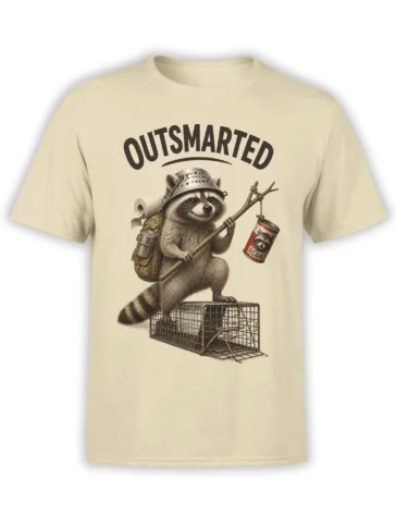 Beige T-shirt with an “OUTSMARTED” raccoon escaping an open wire trap with a backpack and bean can