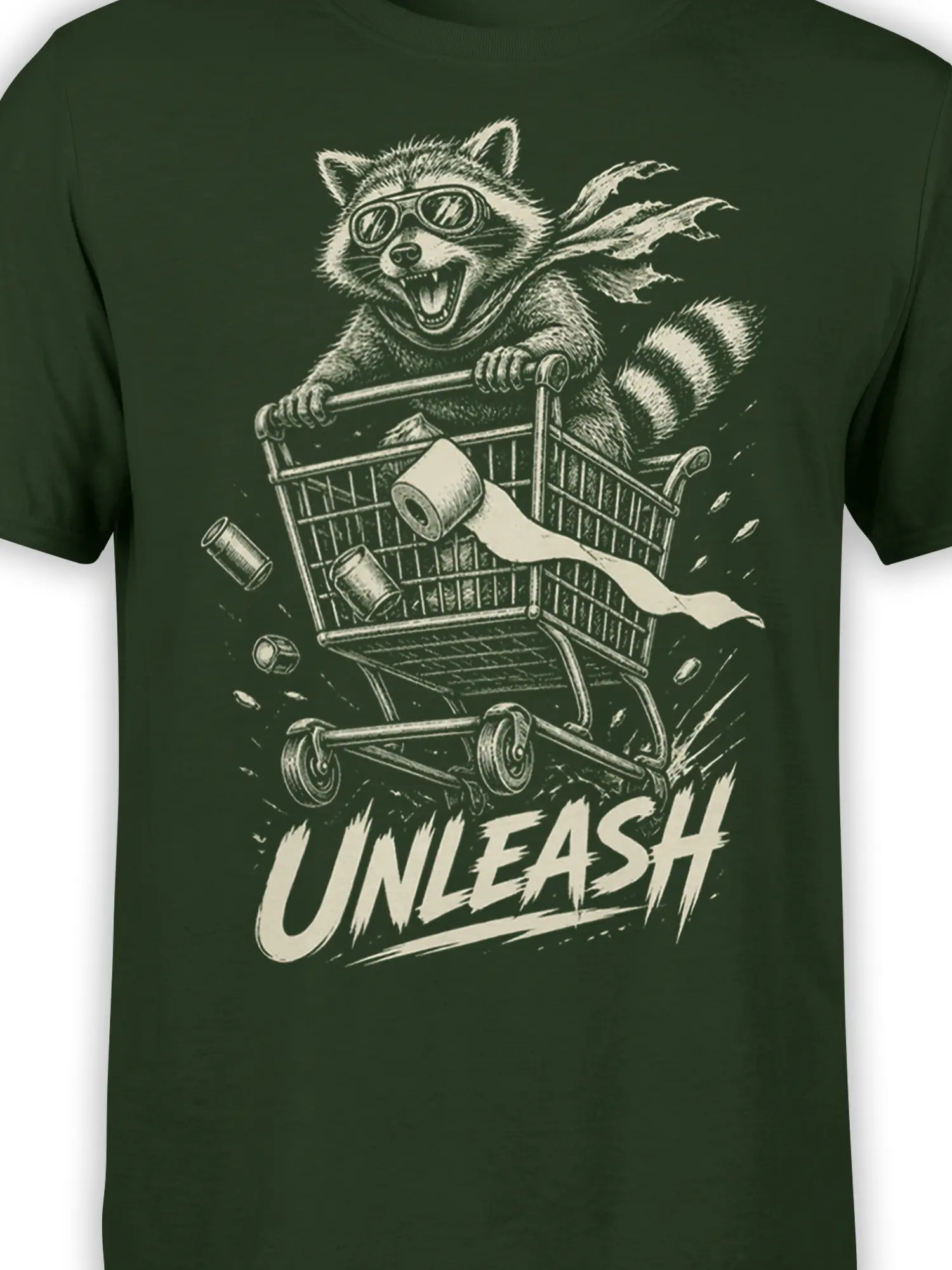 Close-up of the goggled raccoon, shopping cart, flying scarf, and “UNLEASH” print on a green T-shirt