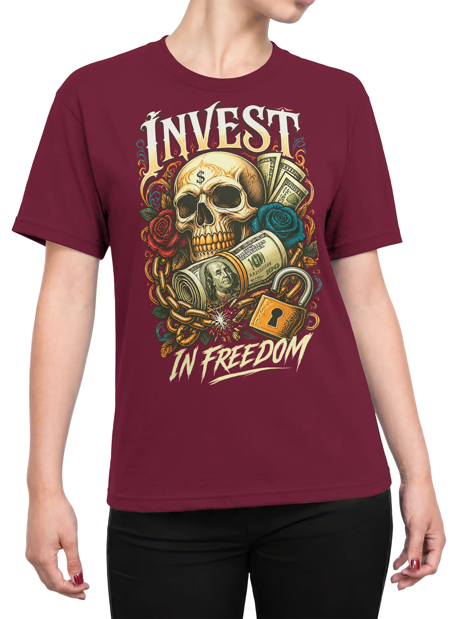 Female torso wearing a burgundy T-shirt with a skull, money, roses, broken chain, and freedom-themed graphic