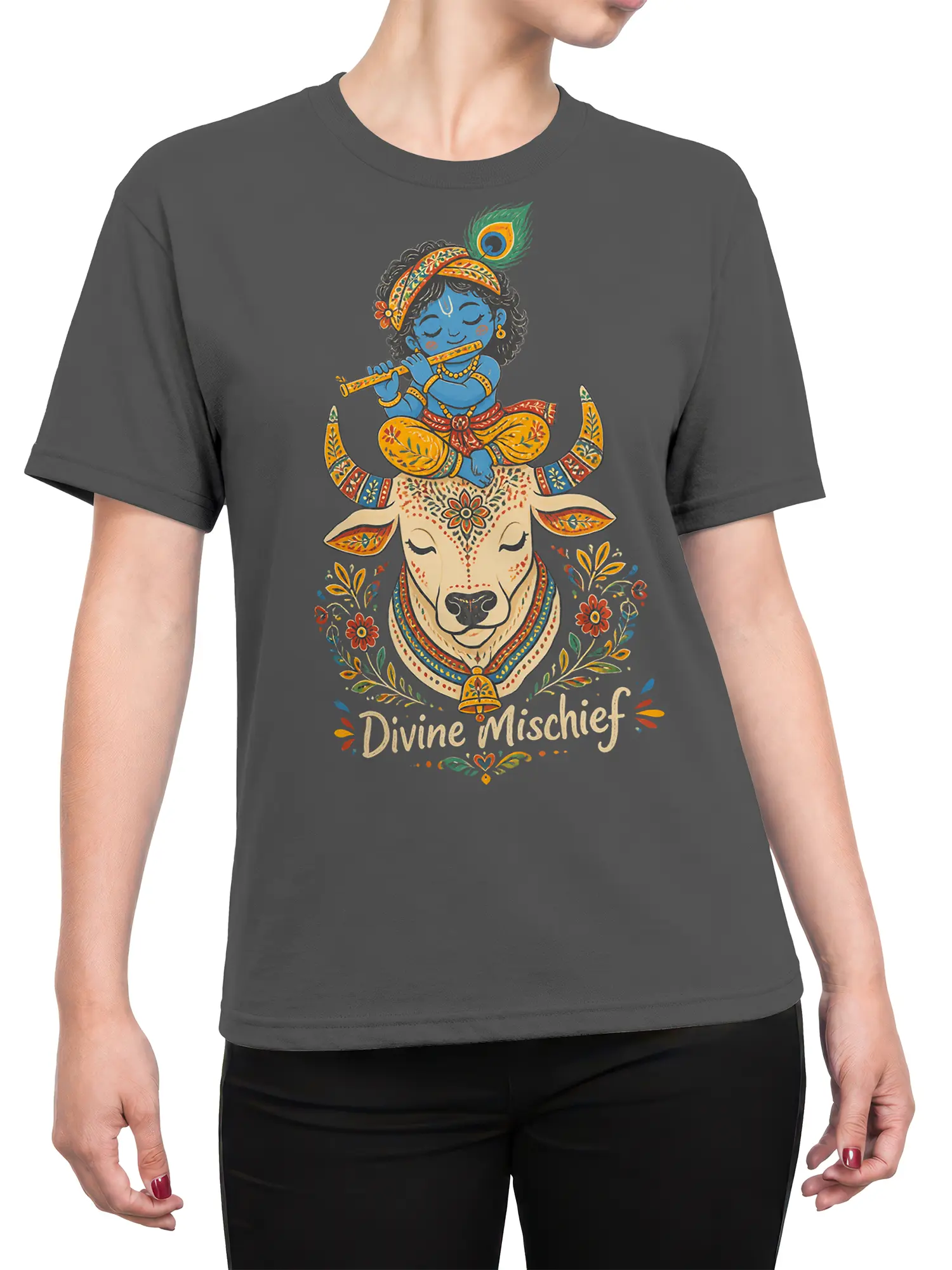 Female torso wearing a gray Divine Mischief T-shirt with a flute player and decorated cow