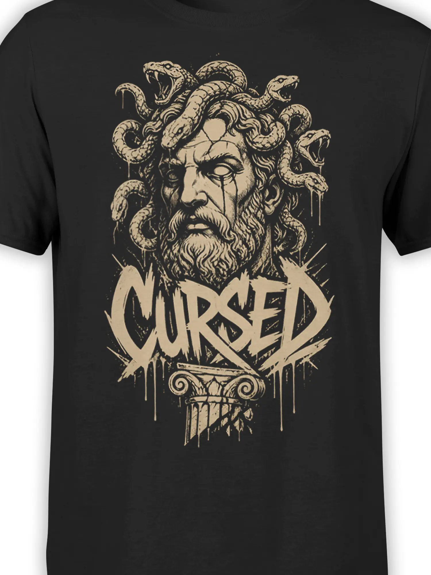 Close-up of the cursed gorgon artwork with detailed serpents, a bearded face, and beige lettering on black fabric