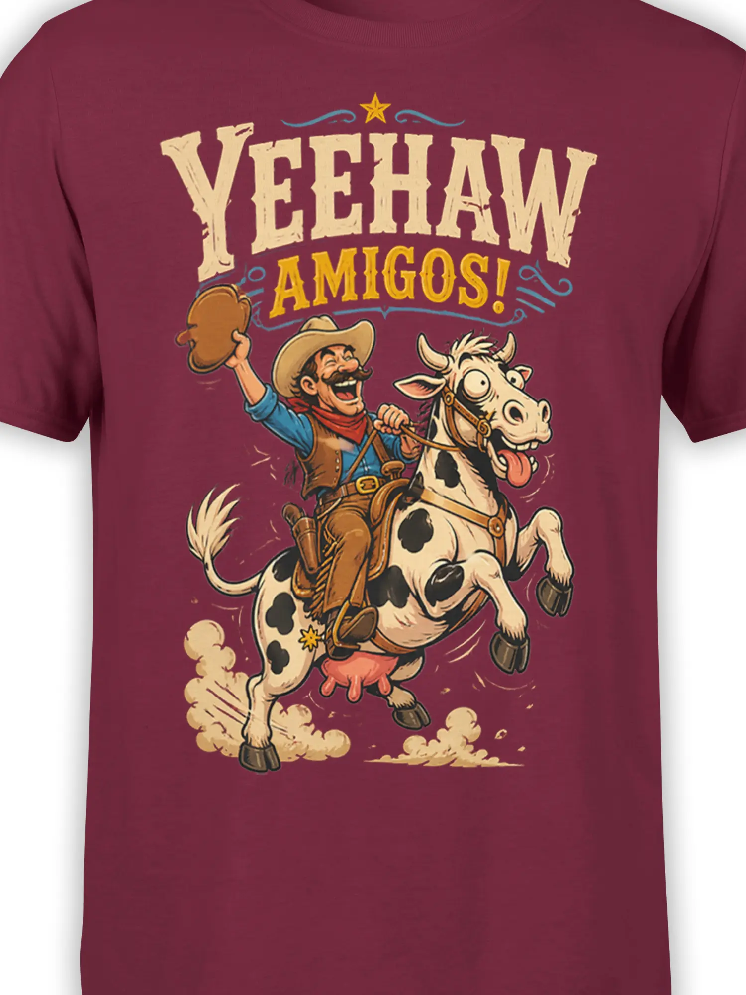 Close-up of cowboy and leaping cow artwork with Yeehaw Amigos text on burgundy fabric