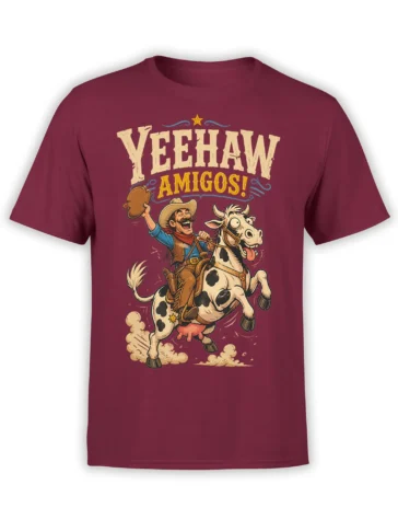 Vintage cowboy riding a leaping cow with Yeehaw Amigos lettering on a burgundy T-shirt