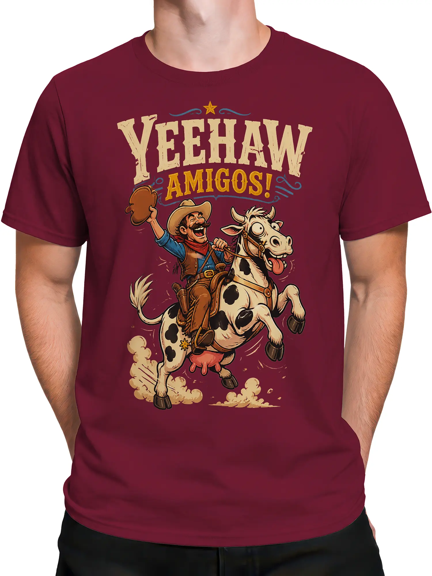 Male torso wearing a burgundy T-shirt with cowboy riding cow graphic and Yeehaw Amigos lettering