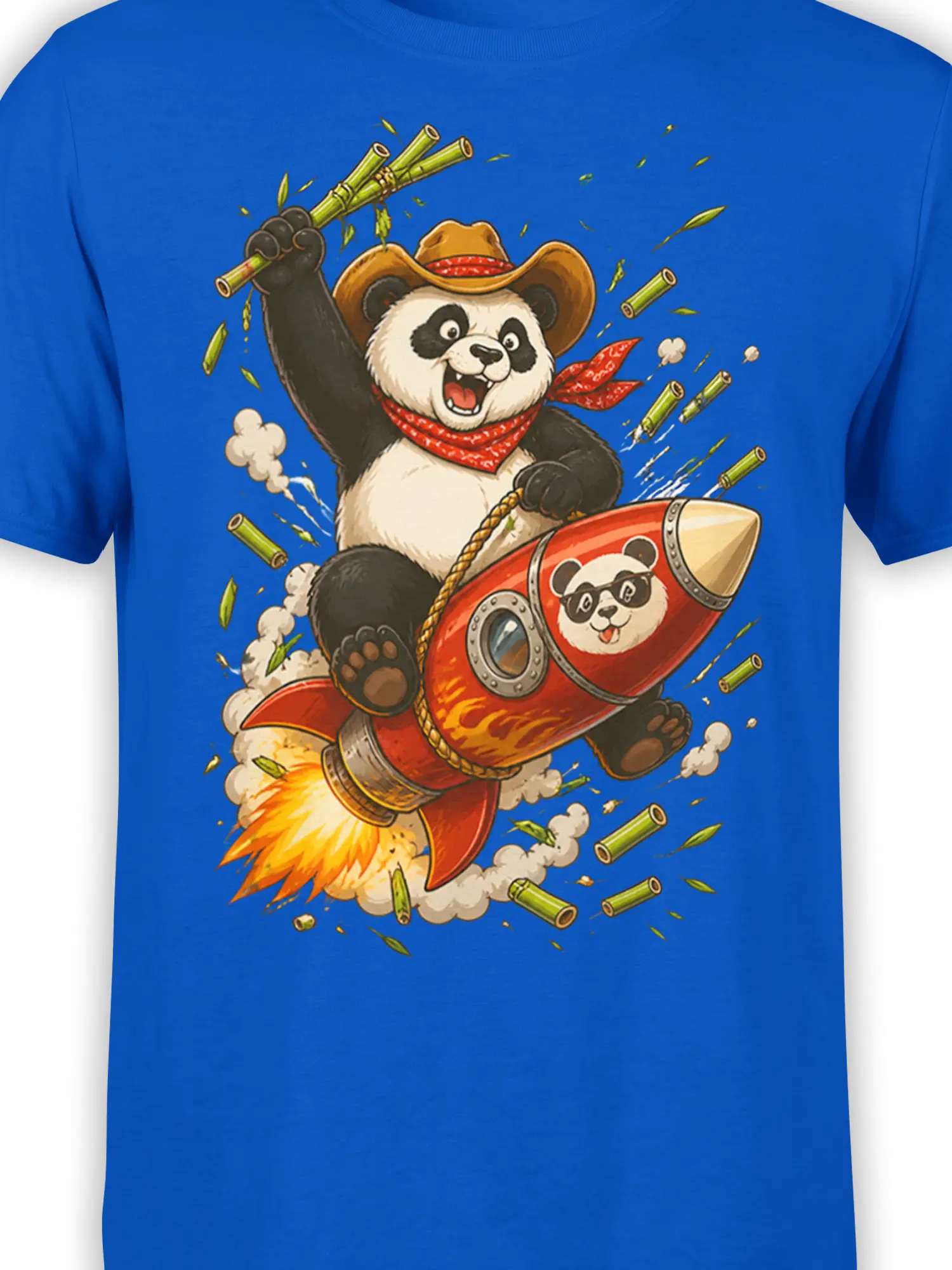 Close-up of cowboy panda rocket artwork with bamboo pieces, flames, and a goggle-wearing panda on blue fabric