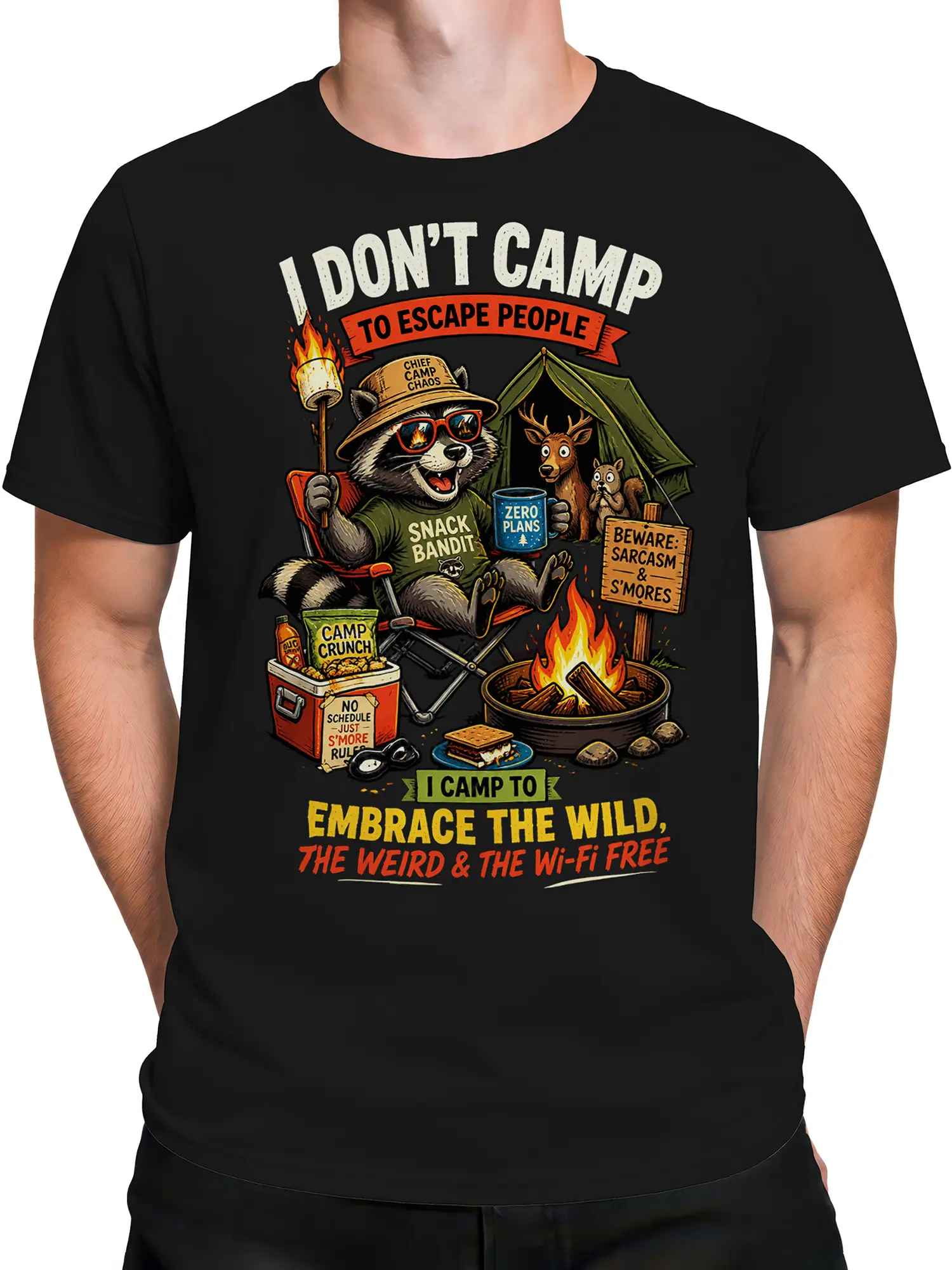 Male torso wearing a black camping T-shirt with a raccoon camper, woodland scene, campfire, and sarcastic lettering
