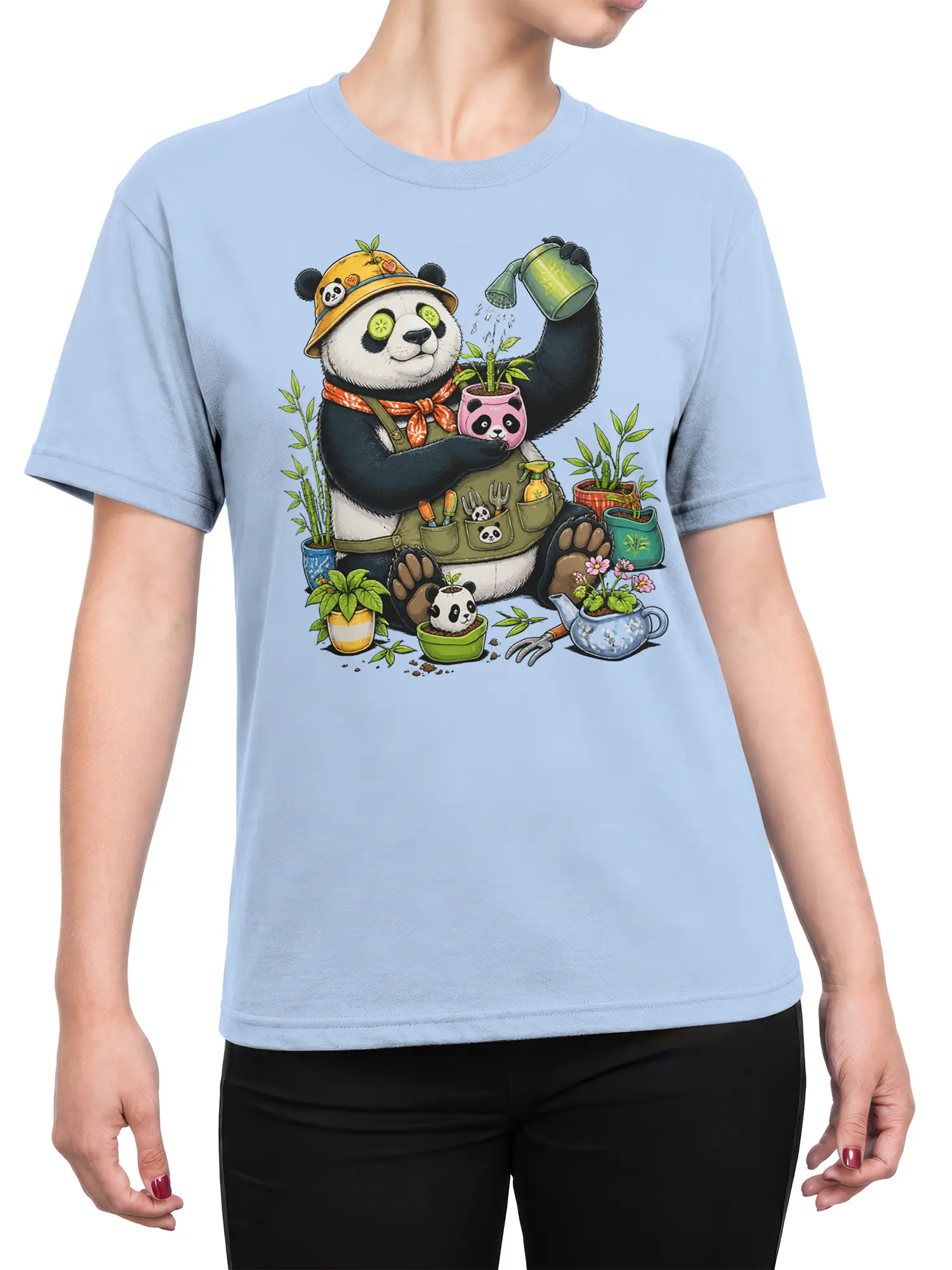 Female torso wearing a light blue panda gardener T-shirt with colorful plants and bamboo artwork