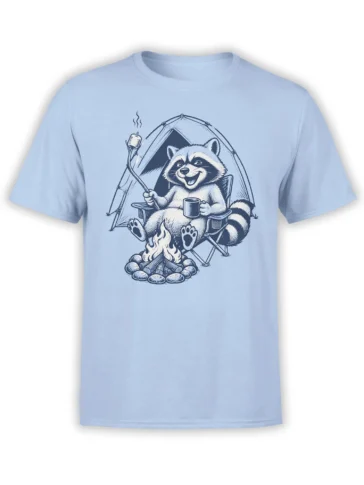 Light blue T-shirt featuring a cheerful raccoon camping by a fire with a mug, marshmallow, chair, and tent