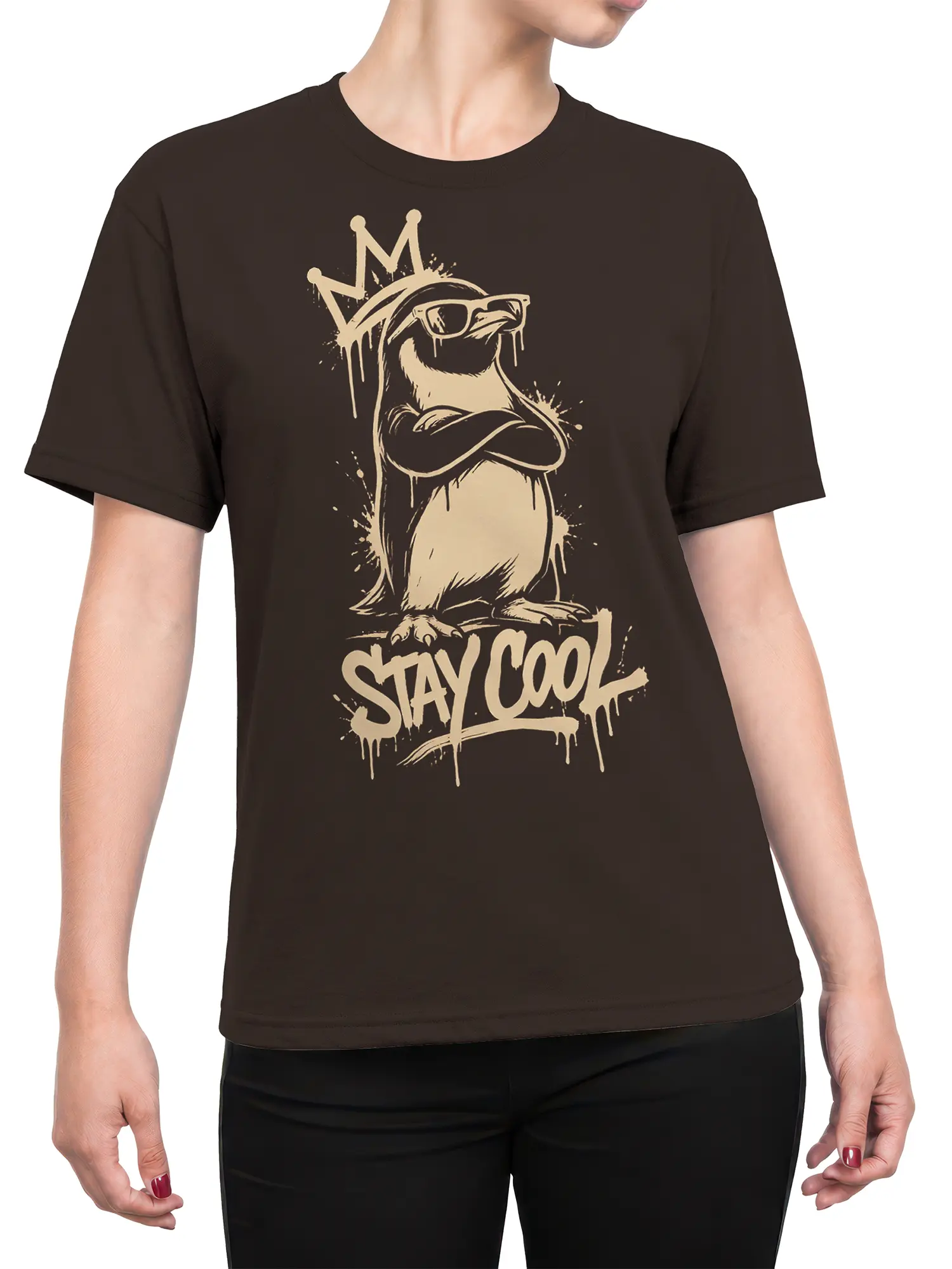 Female torso wearing a brown T-shirt with a crowned bird in sunglasses and STAY COOL graphic