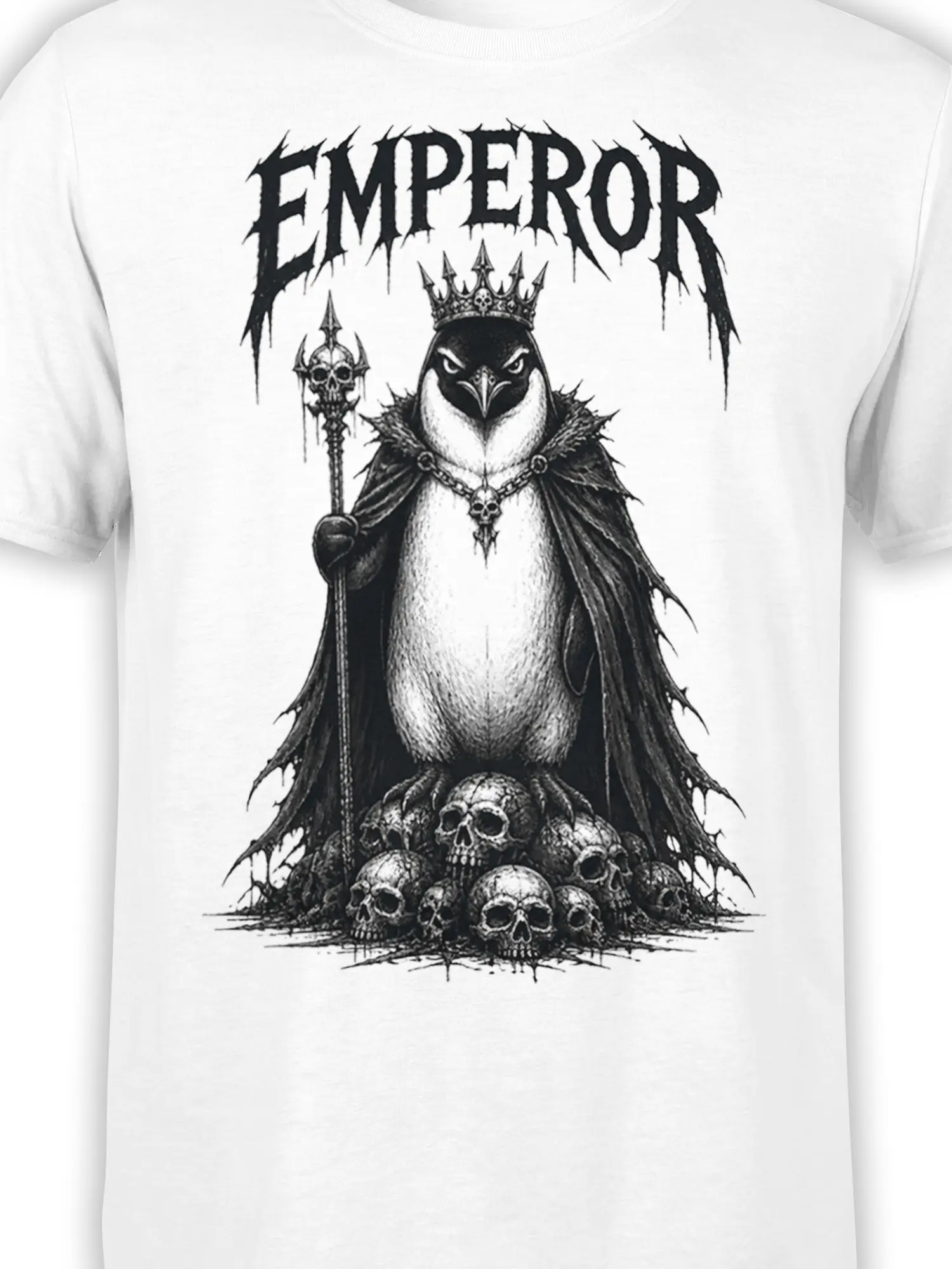 Close-up of crowned penguin artwork with skull staff, bone details, dark cape, and EMPEROR text on white fabric
