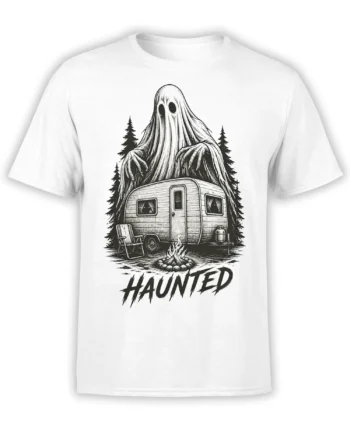 White T-shirt with a black-and-white haunted ghost behind a camper, pine trees, campfire, and bold text