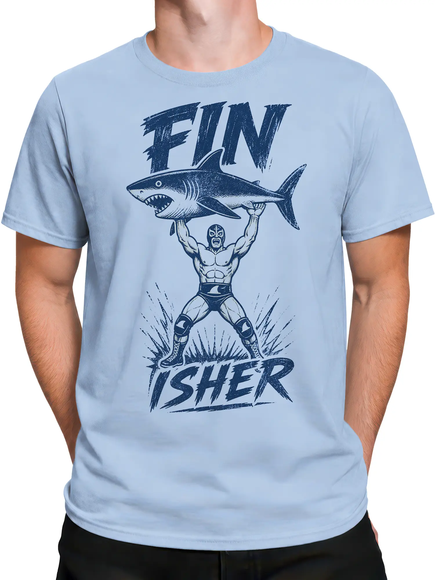 Male torso wearing a light blue T-shirt with masked wrestler shark artwork