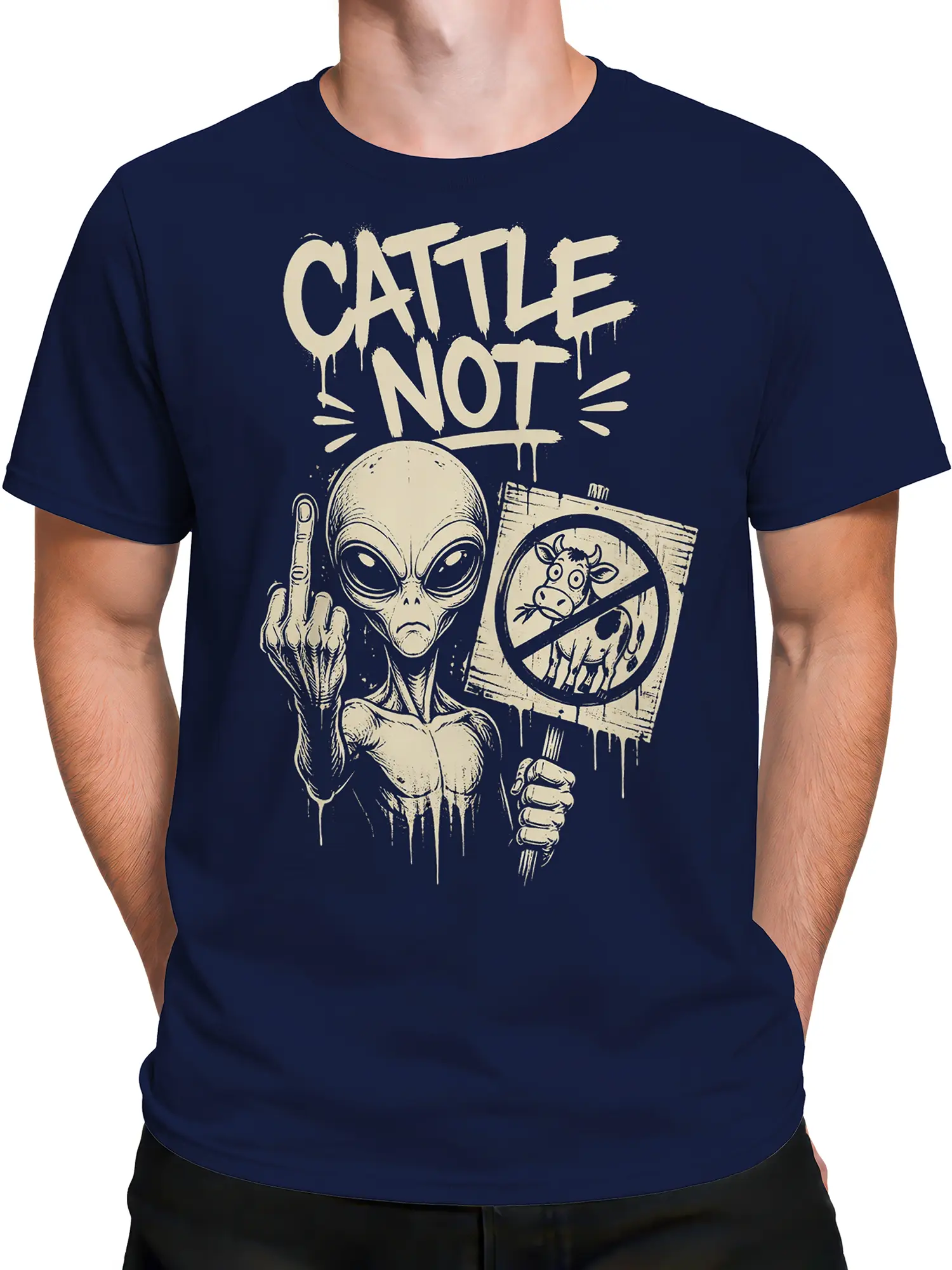 Male torso wearing a navy alien T-shirt with cream cattle protest artwork and crossed-out cow graphic