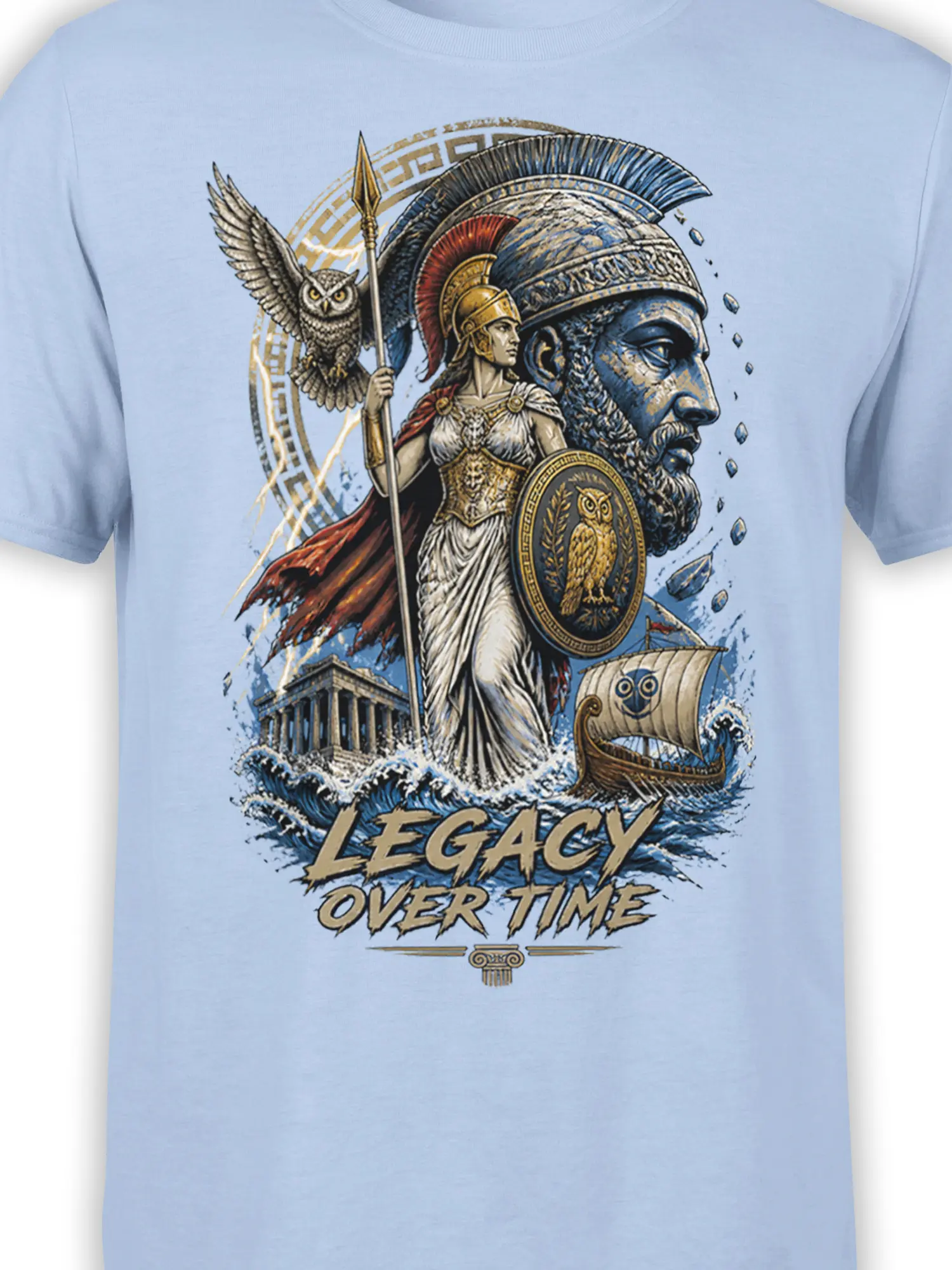 Close-up of Greek goddess, warrior, owl, shield, and Legacy Over Time artwork on a light blue T-shirt