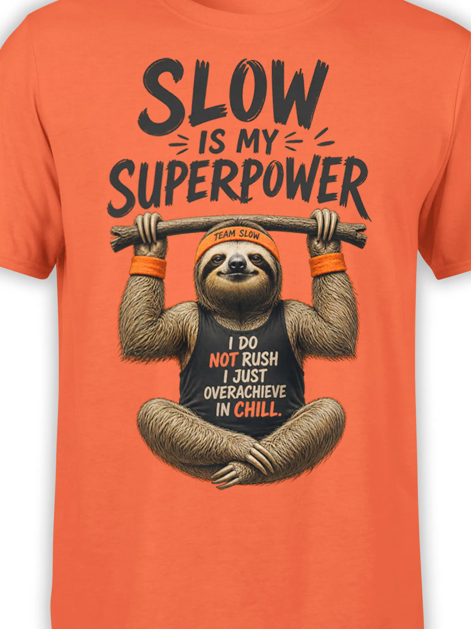 Close-up of sloth graphic, branch, Team Slow headband, and chill message on orange fabric