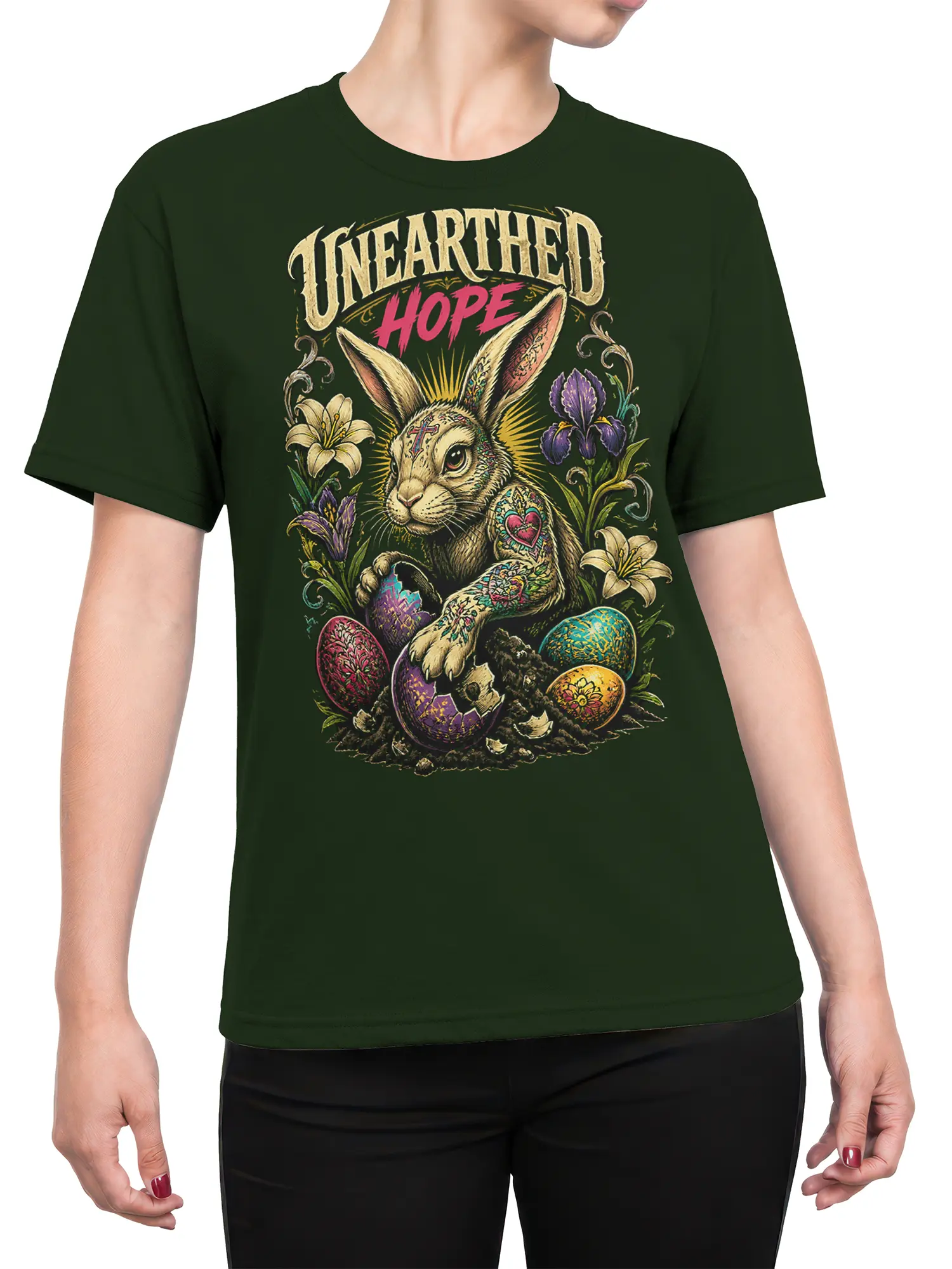 Female torso wearing a green rabbit T-shirt with flowers, eggs, and “Unearthed Hope” artwork