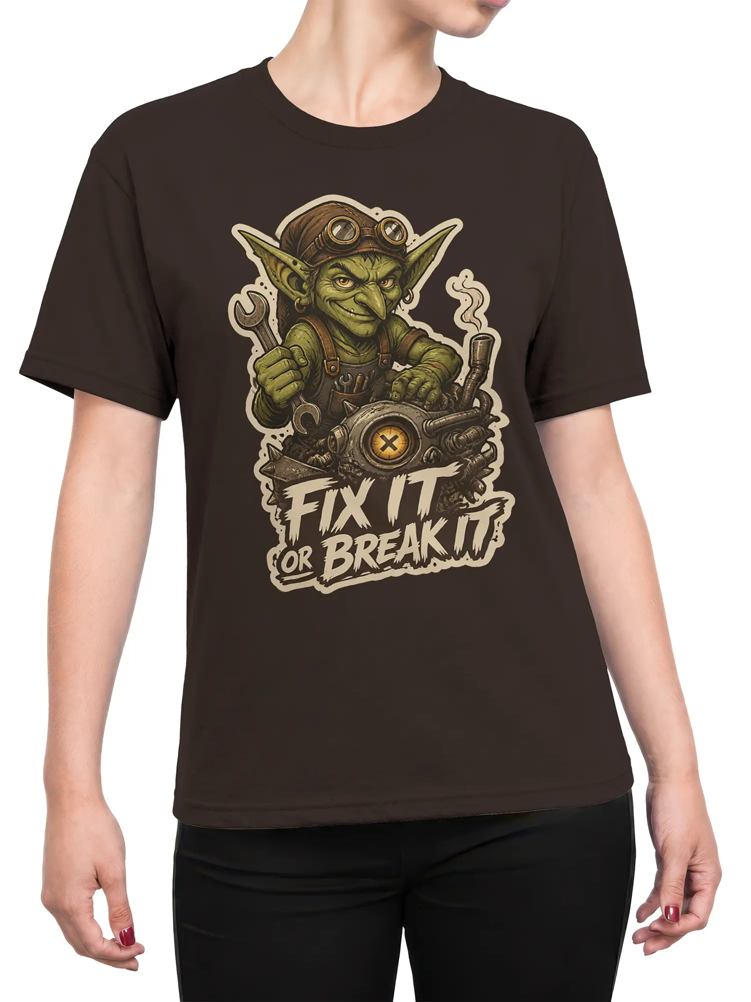 Female torso wearing a dark brown T-shirt with a green goblin mechanic and “Fix It or Break It” artwork