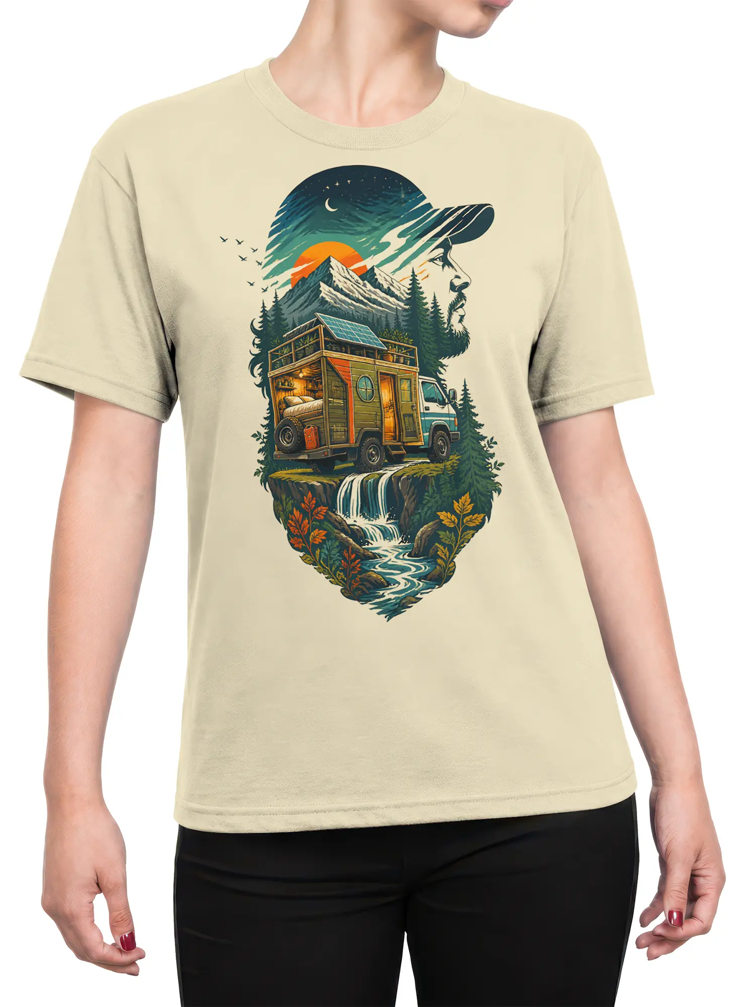 Female torso wearing a beige camper van T-shirt with a scenic mountain, forest, waterfall, and sunset design