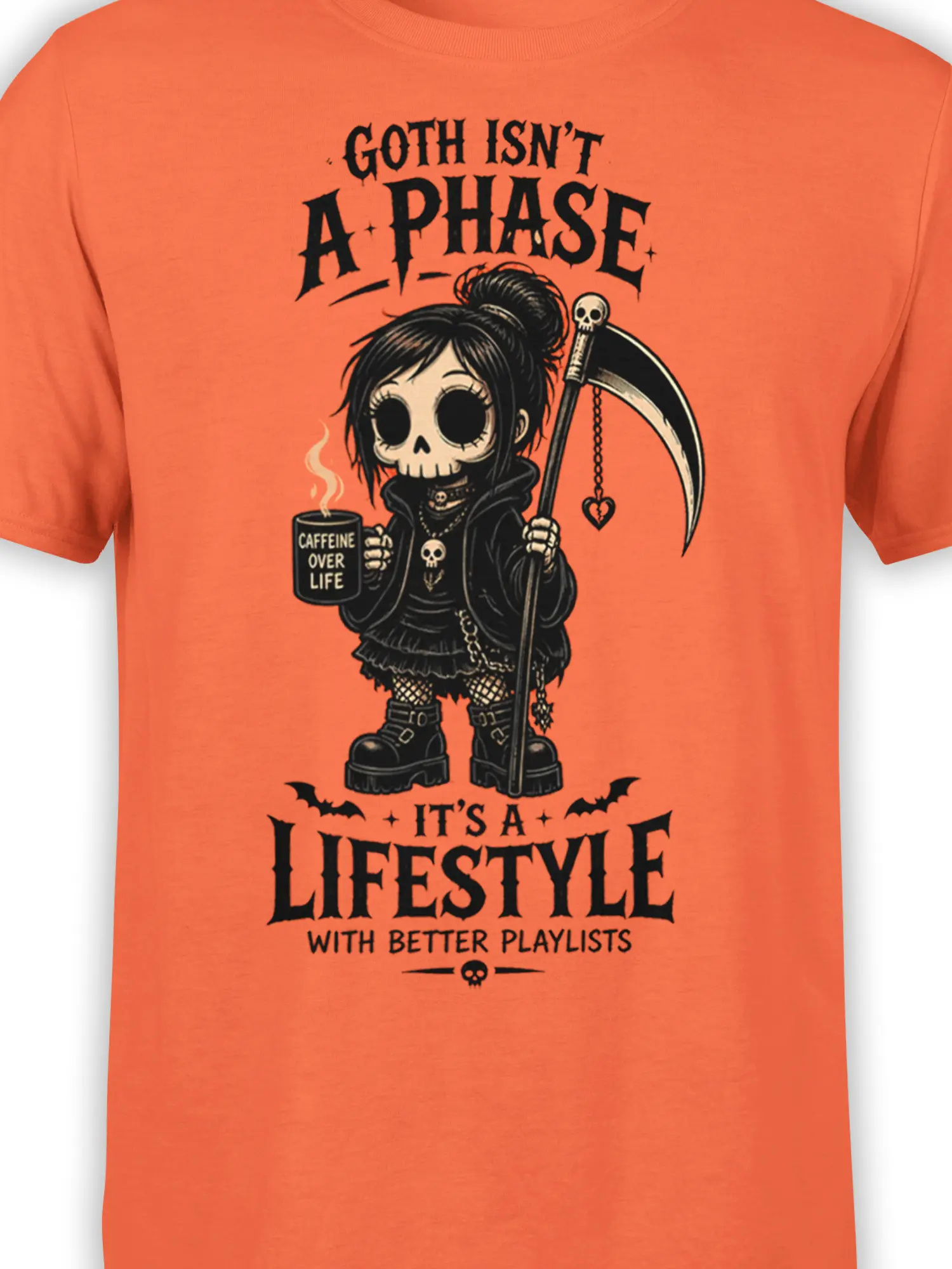 Close-up of gothic reaper girl artwork with scythe and coffee mug on orange fabric