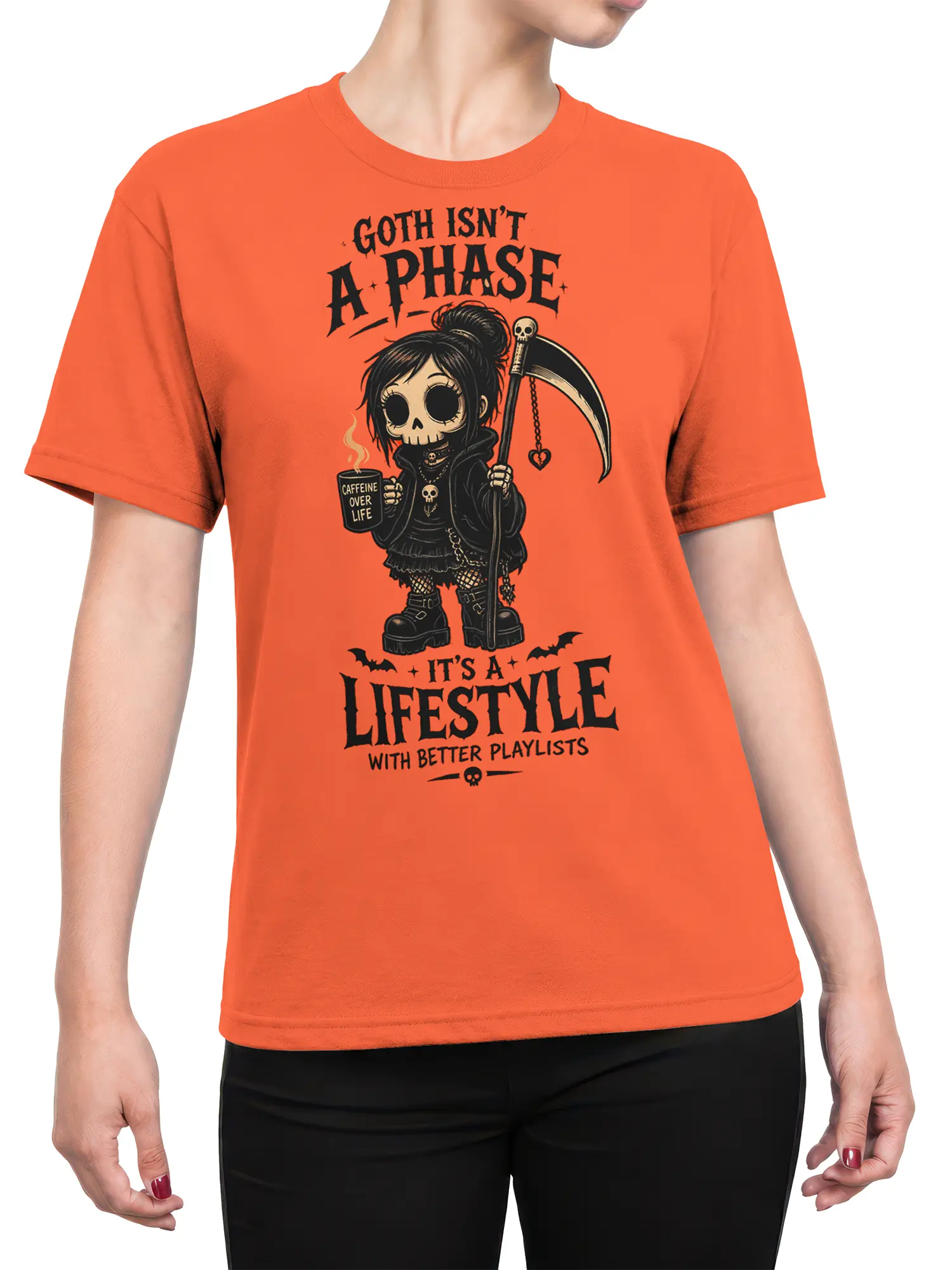 Female torso wearing an orange T-shirt with gothic reaper girl and scythe artwork