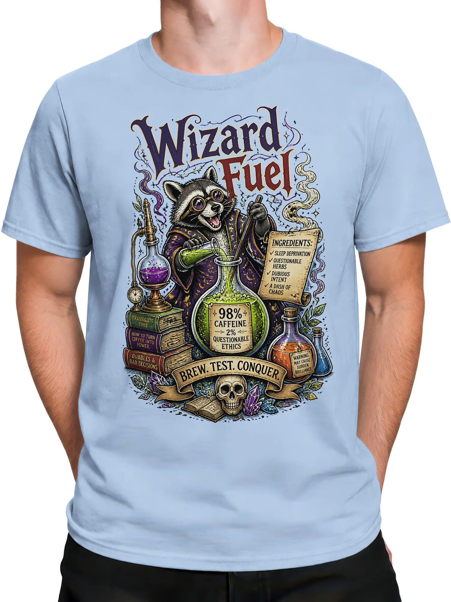 Male torso wearing a light blue T-shirt with a raccoon alchemist brewing wizard fuel