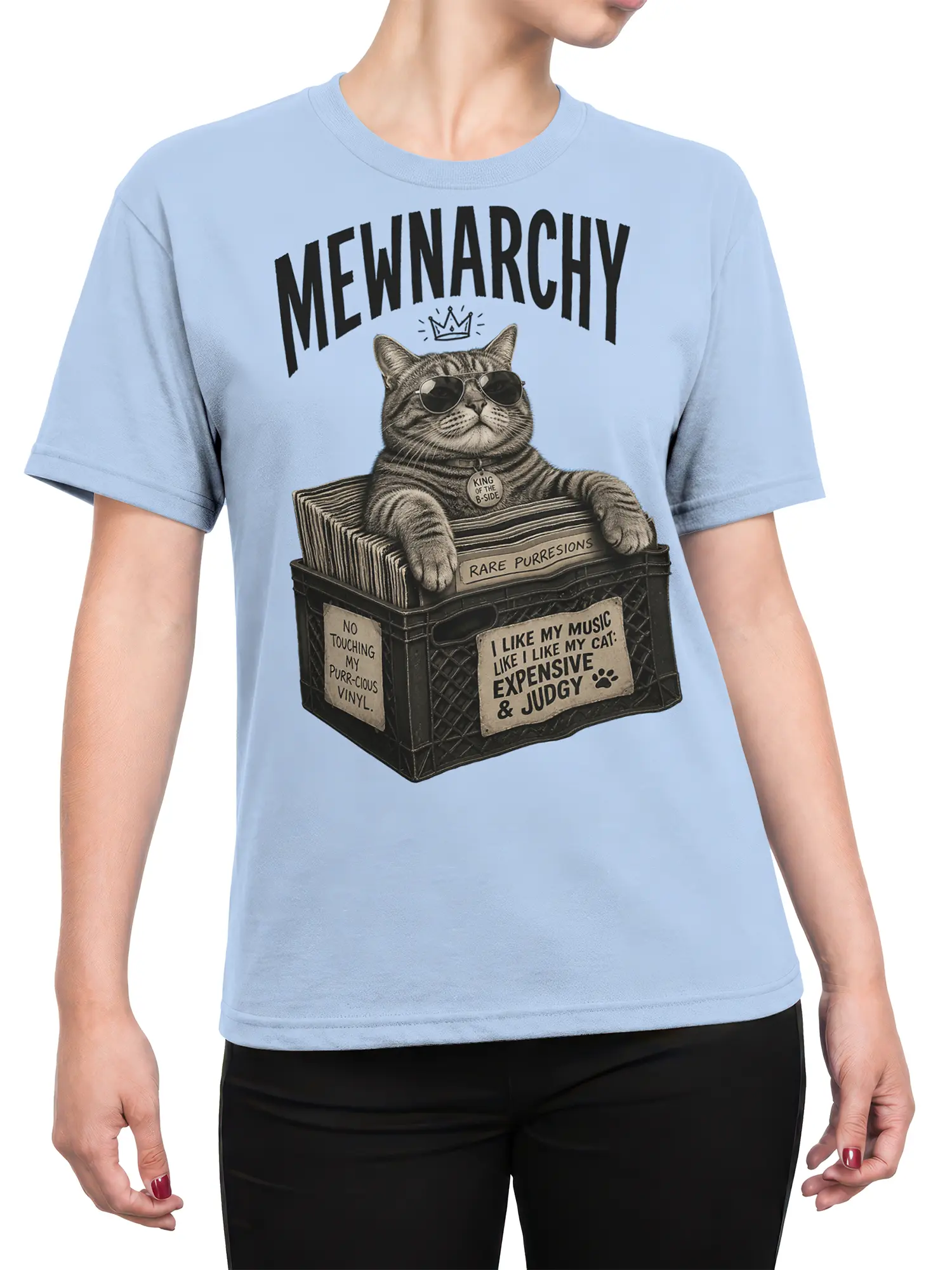 Female torso wearing a light blue vinyl cat T-shirt with a crowned tabby and record crate design